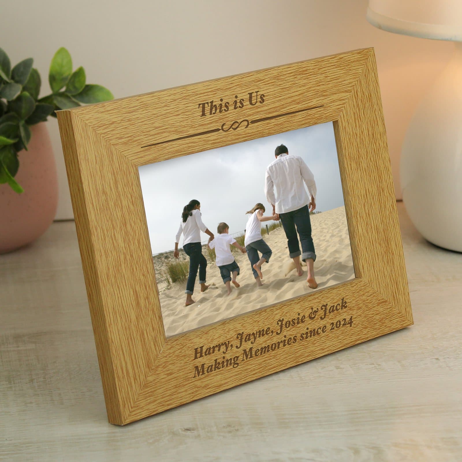 Oak veneer landscape photo frame with personalised text above and below the photo
