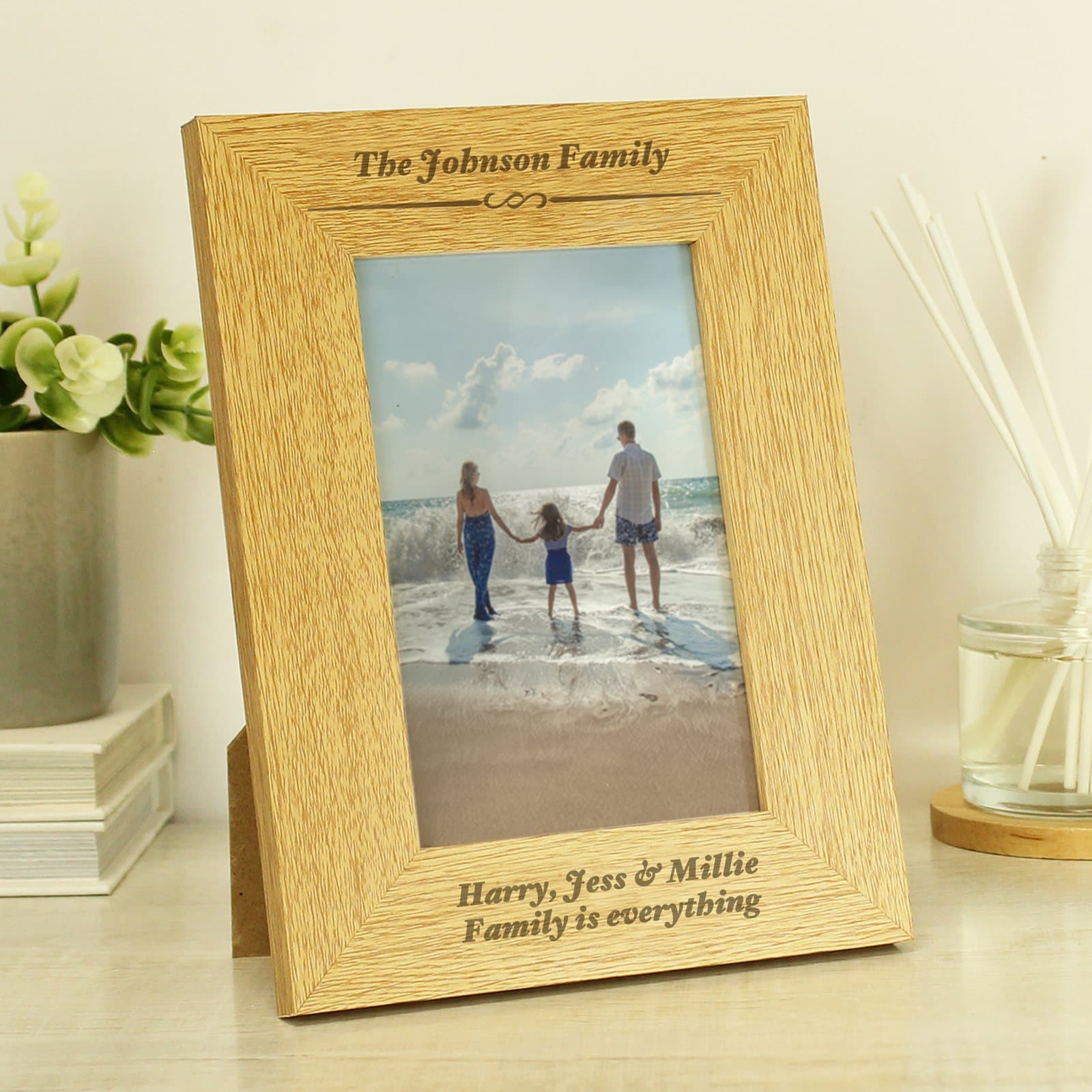 Oak veneer portrait photo frame with personalised text above and below the photo