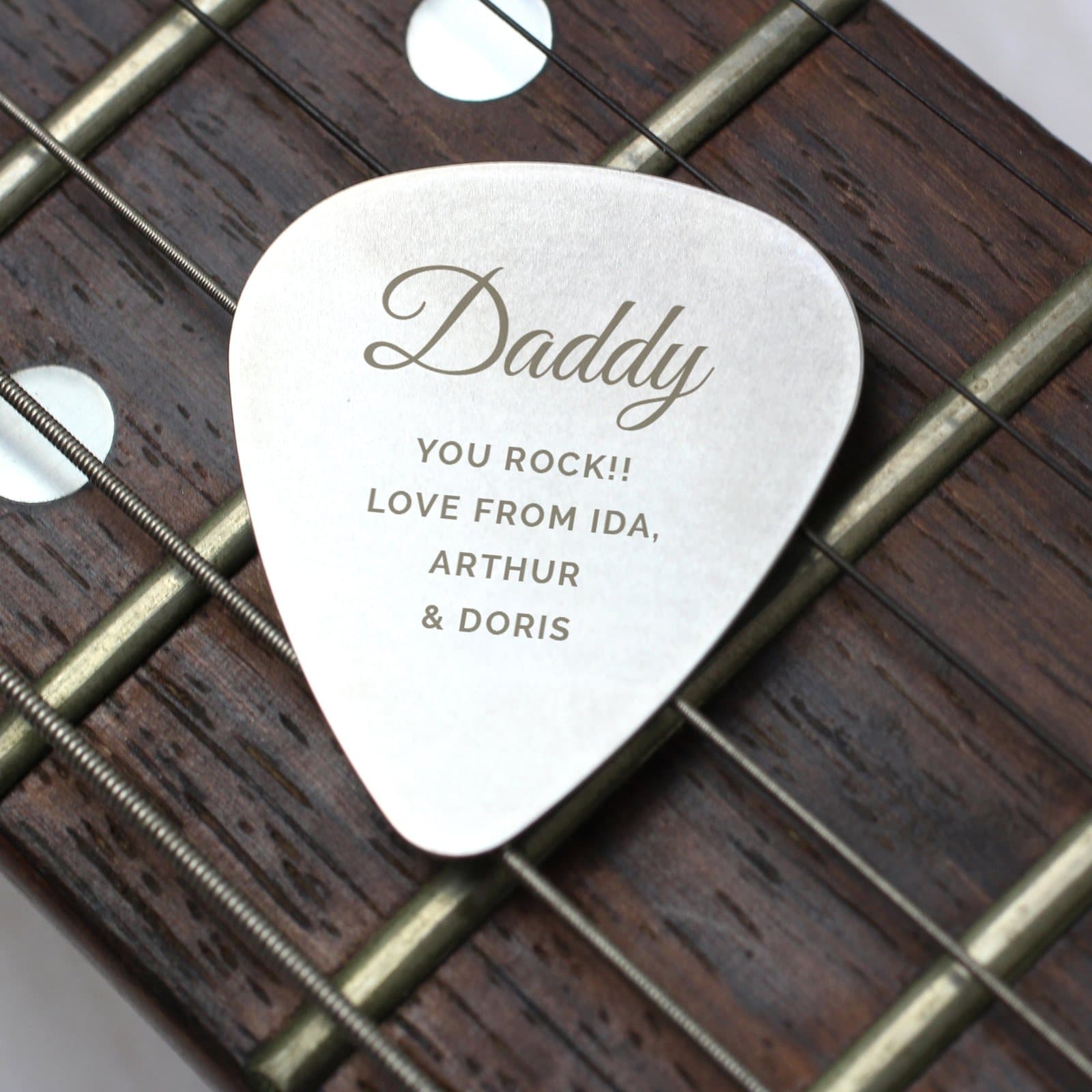 Silver stainless steel plectrum with a name and personalised lines