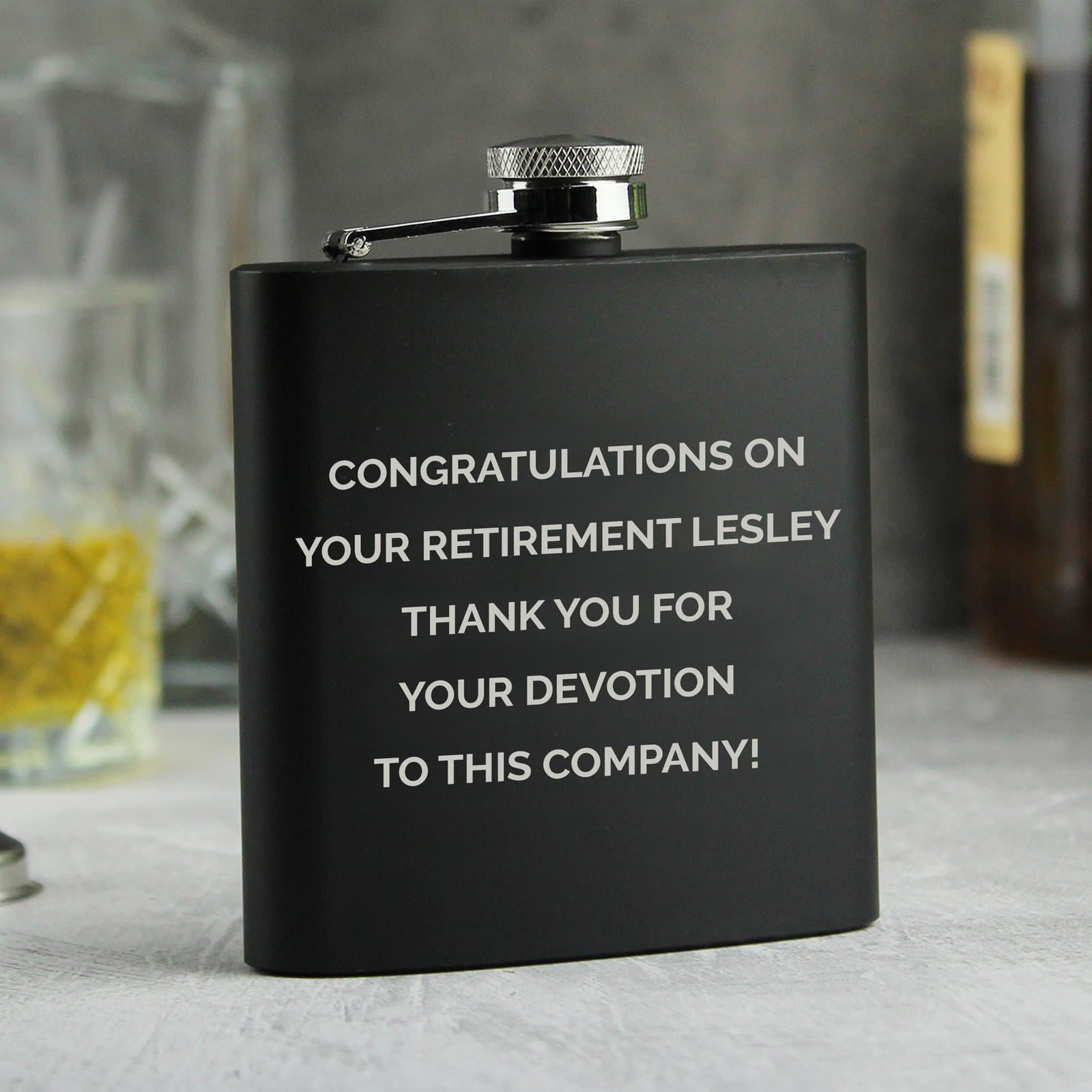 Black stainless steel hip flask with a silk lined presentation box