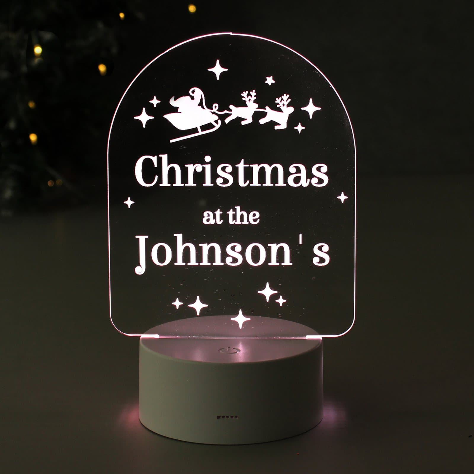 Acrylic Christmas LED light on a base with three lines of text
