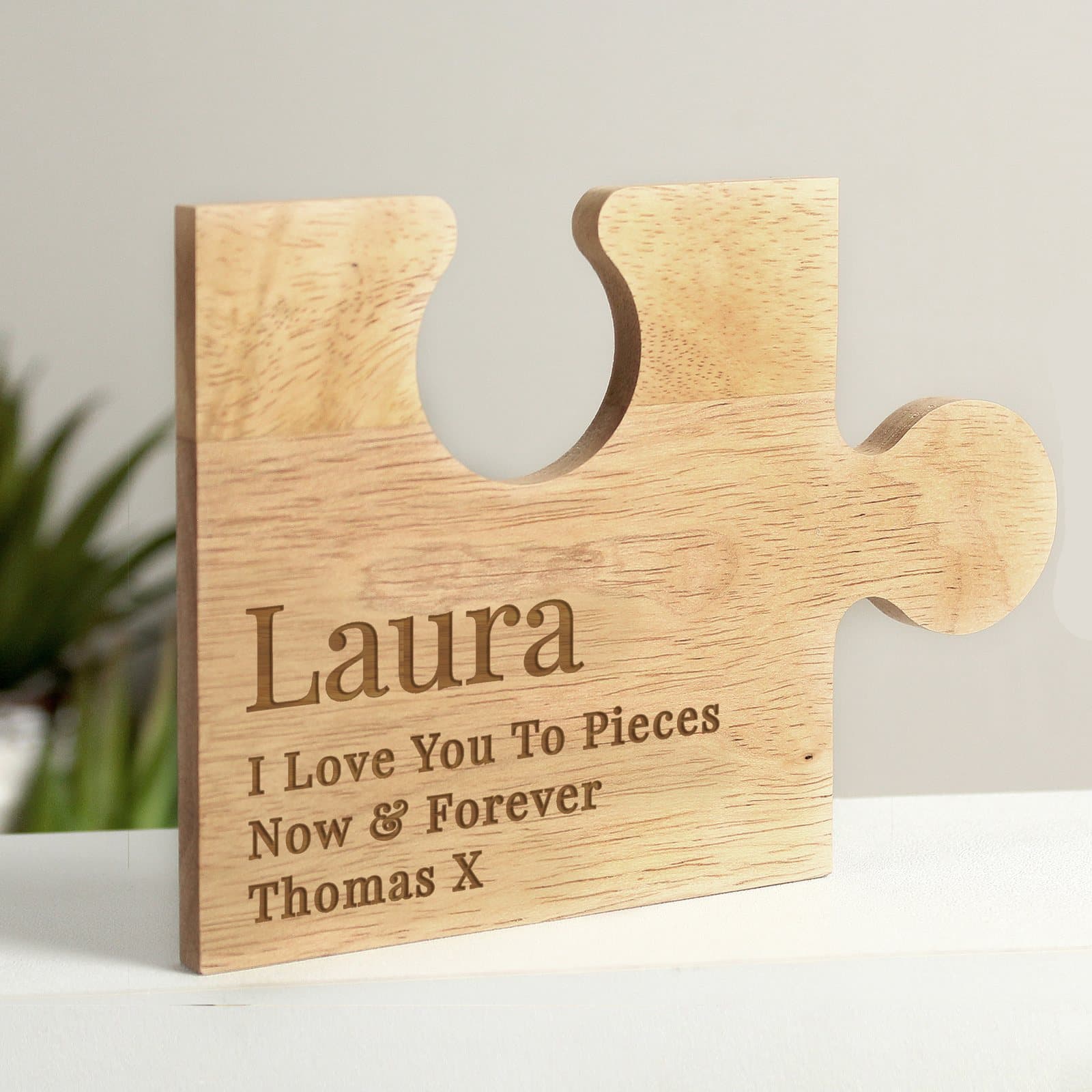 Personalised wooden jigsaw piece with a name and lines of text