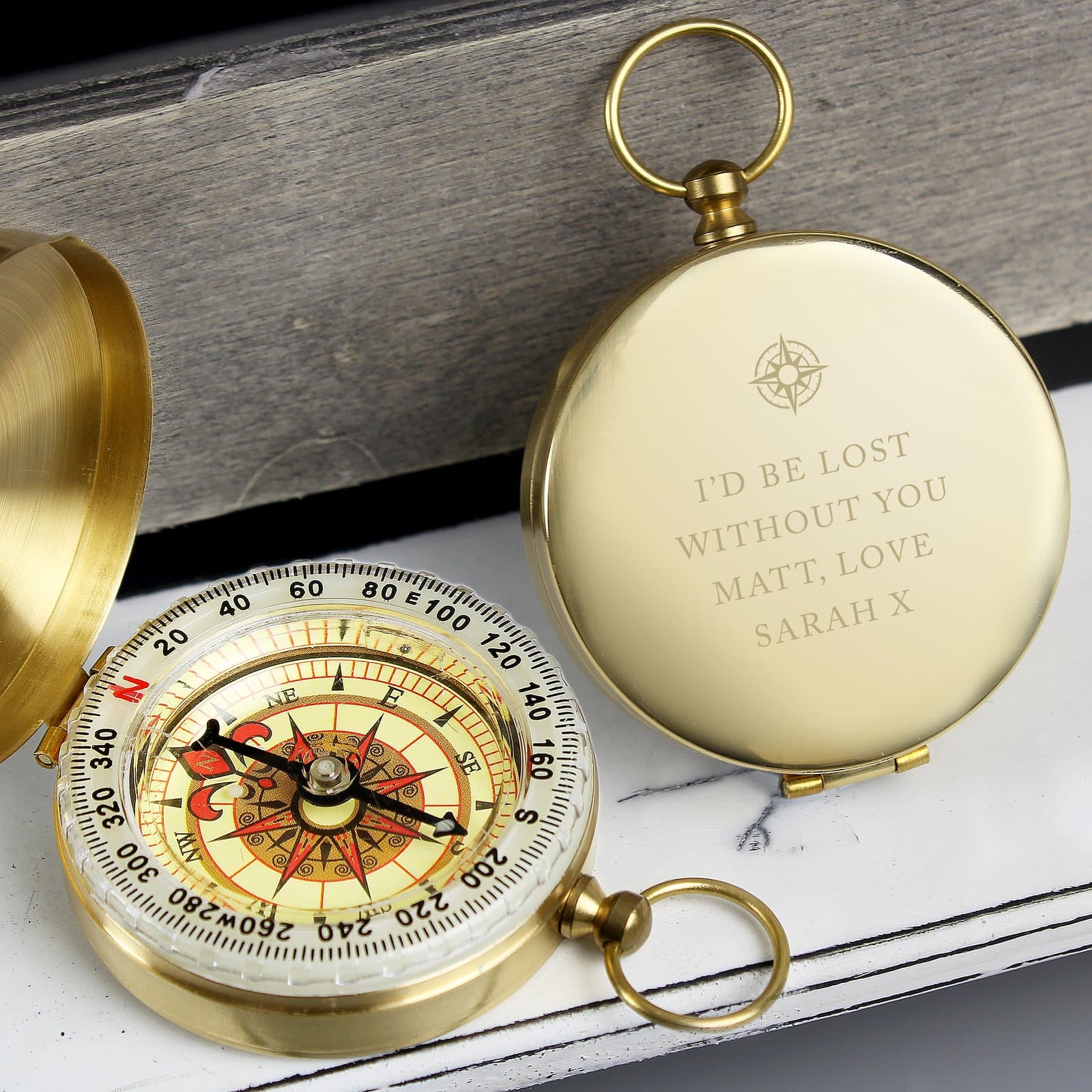 Keepsake compass with a brushed metal effect and four lines of personalised text
