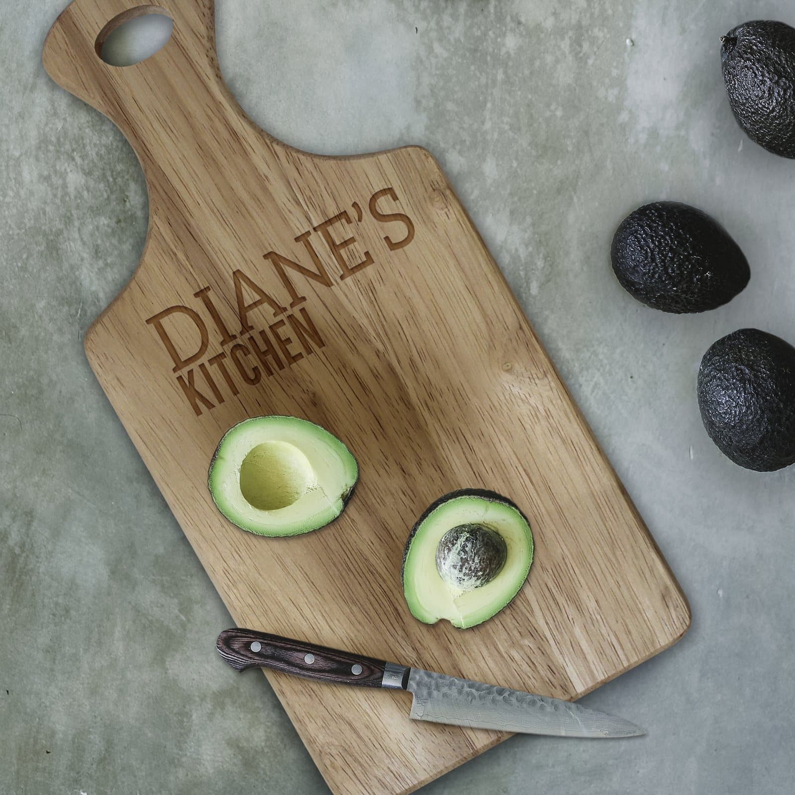 Personalised hevea wood paddle board with two lines of text