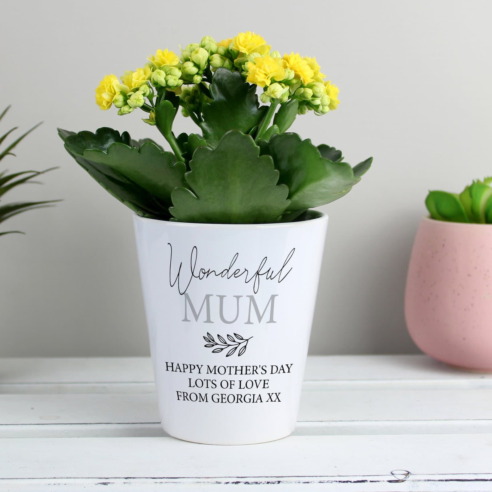 Ceramic plant pot personalised with five lines of text