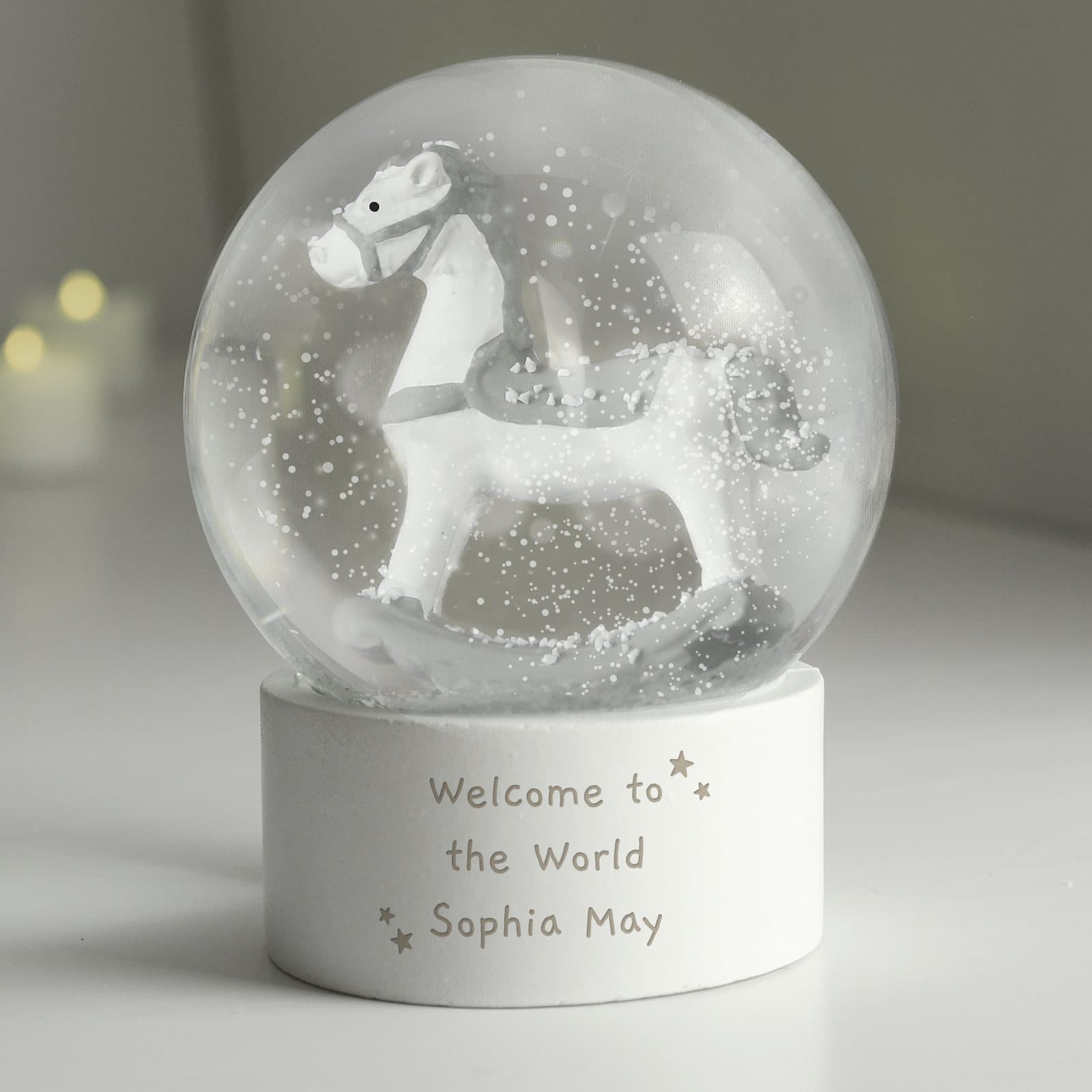 Personalised rocking horse glitter snow globe in resin and plastic