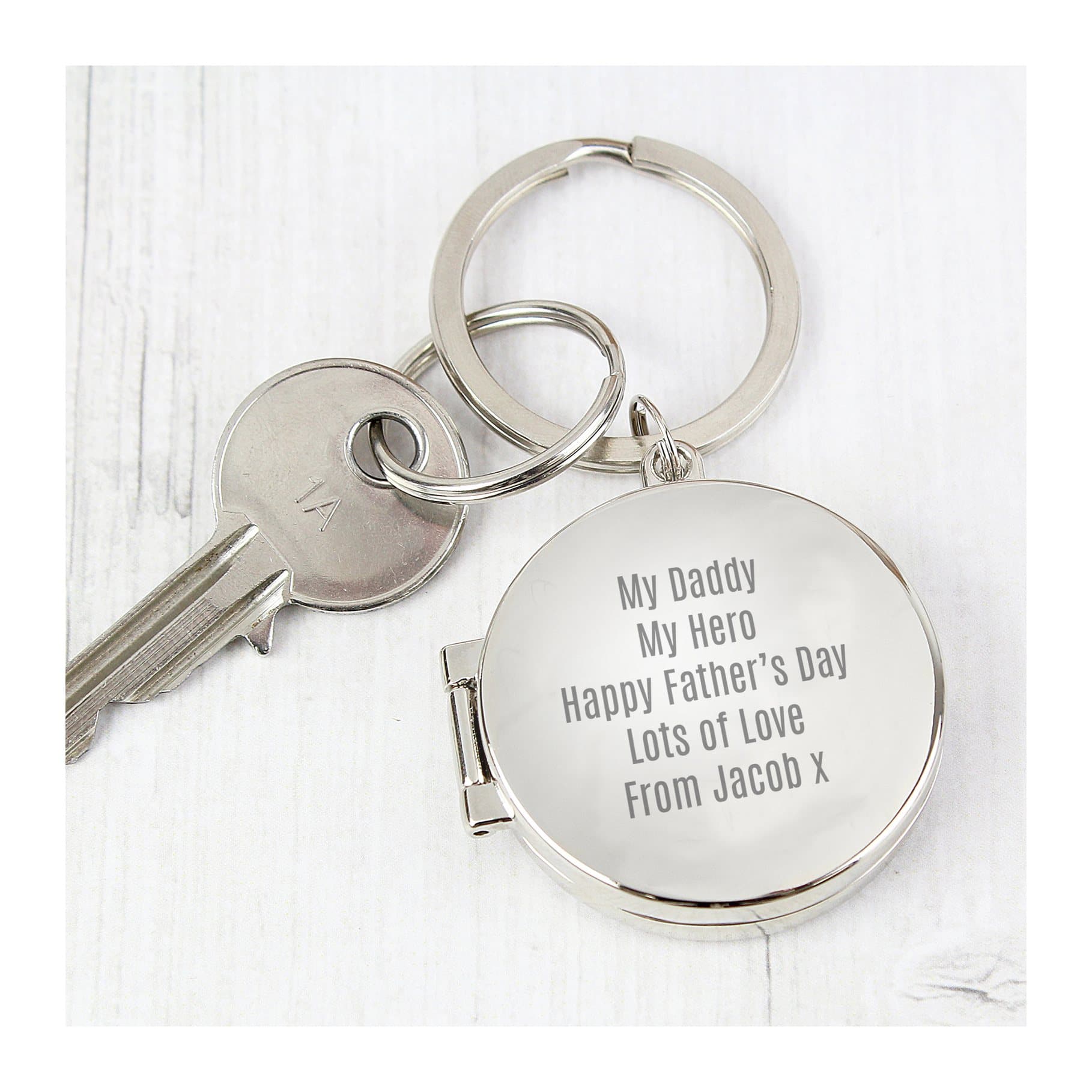 Round silver finish photo keyring with space for five lines of text