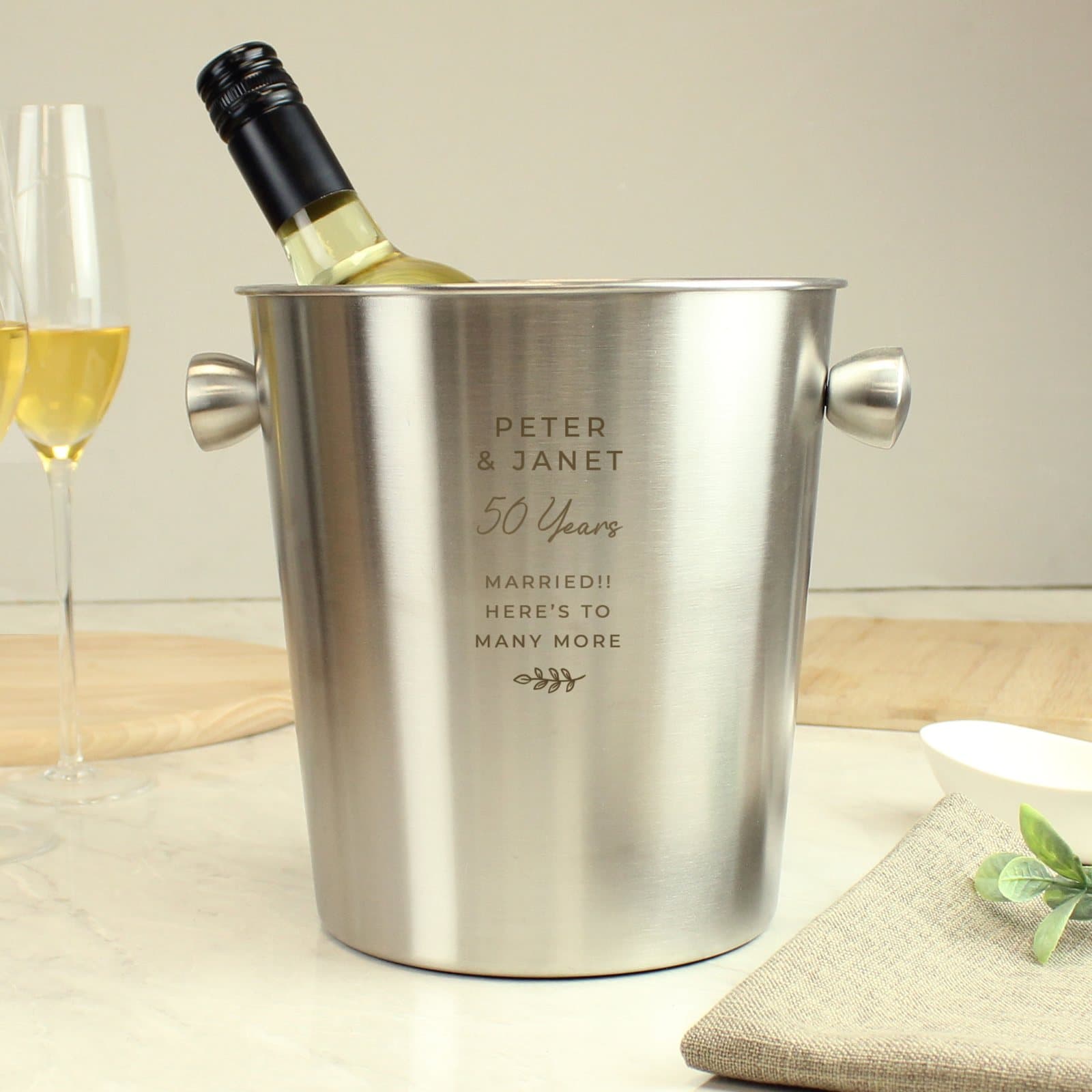 Brushed stainless steel ice bucket with personalised lines of text