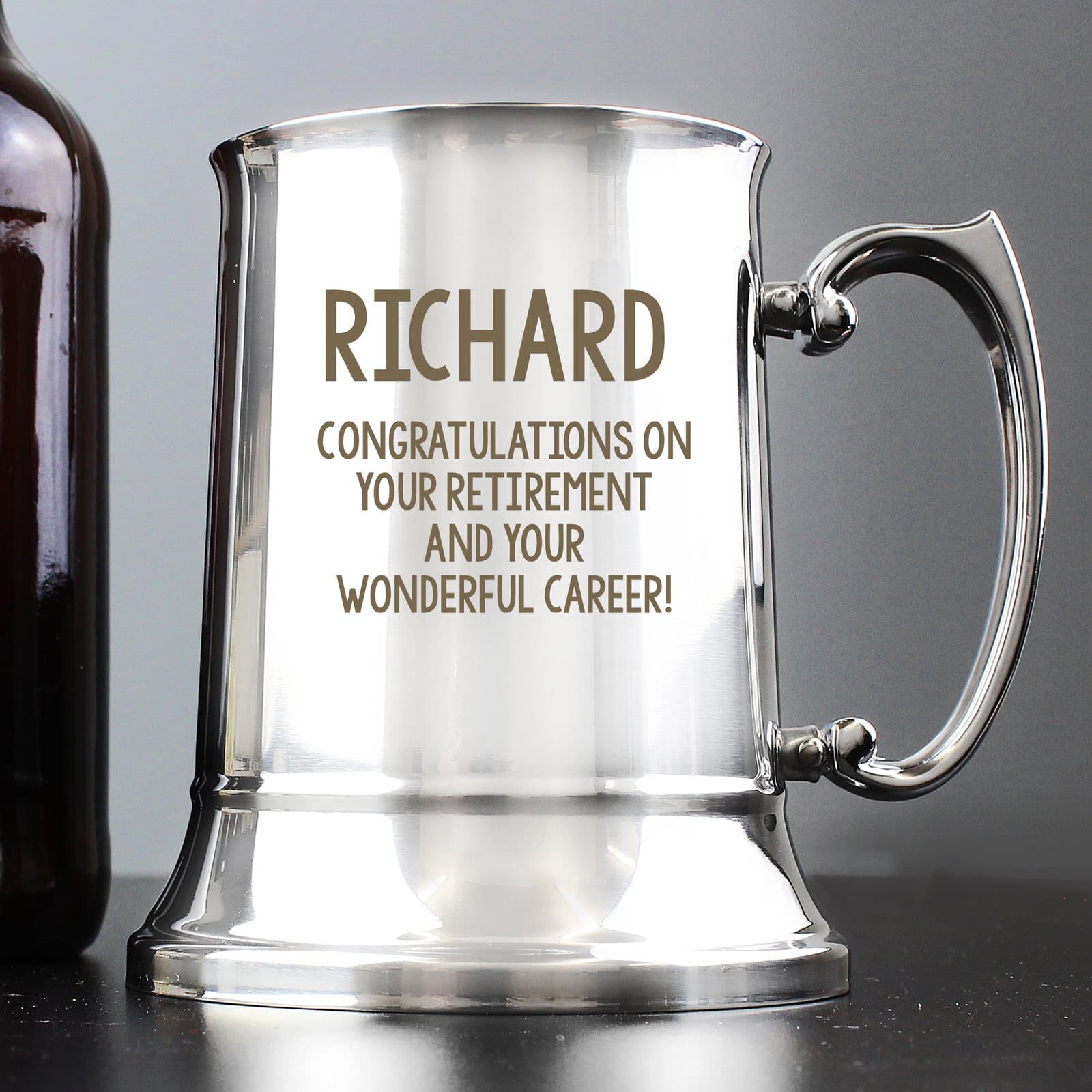 Personalised stainless steel tankard with a name and four lines of text
