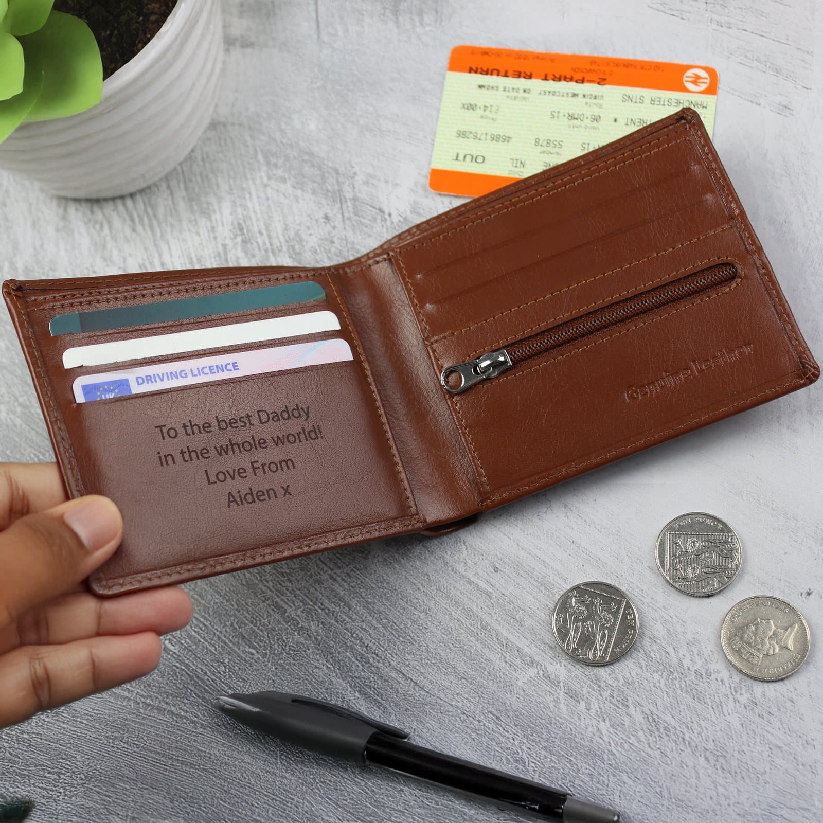 Tan leather wallet that can be personalised with a four-line message