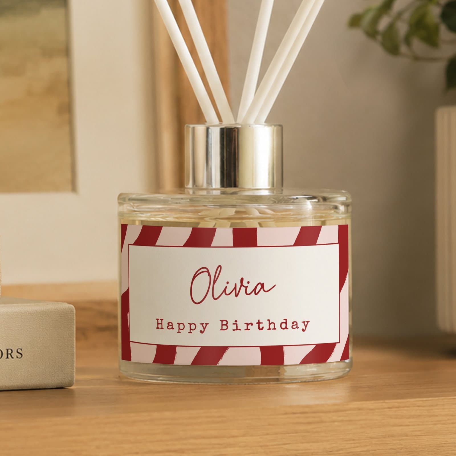 Personalised funky striped reed diffuser in glass with two lines of text