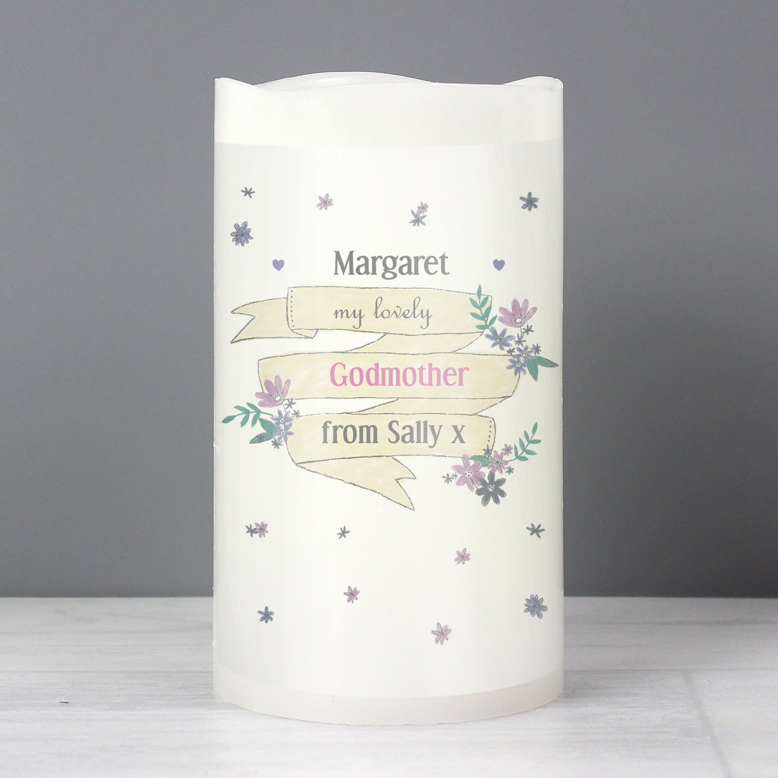 Personalised Garden Bloom LED candle with four lines of text on the front