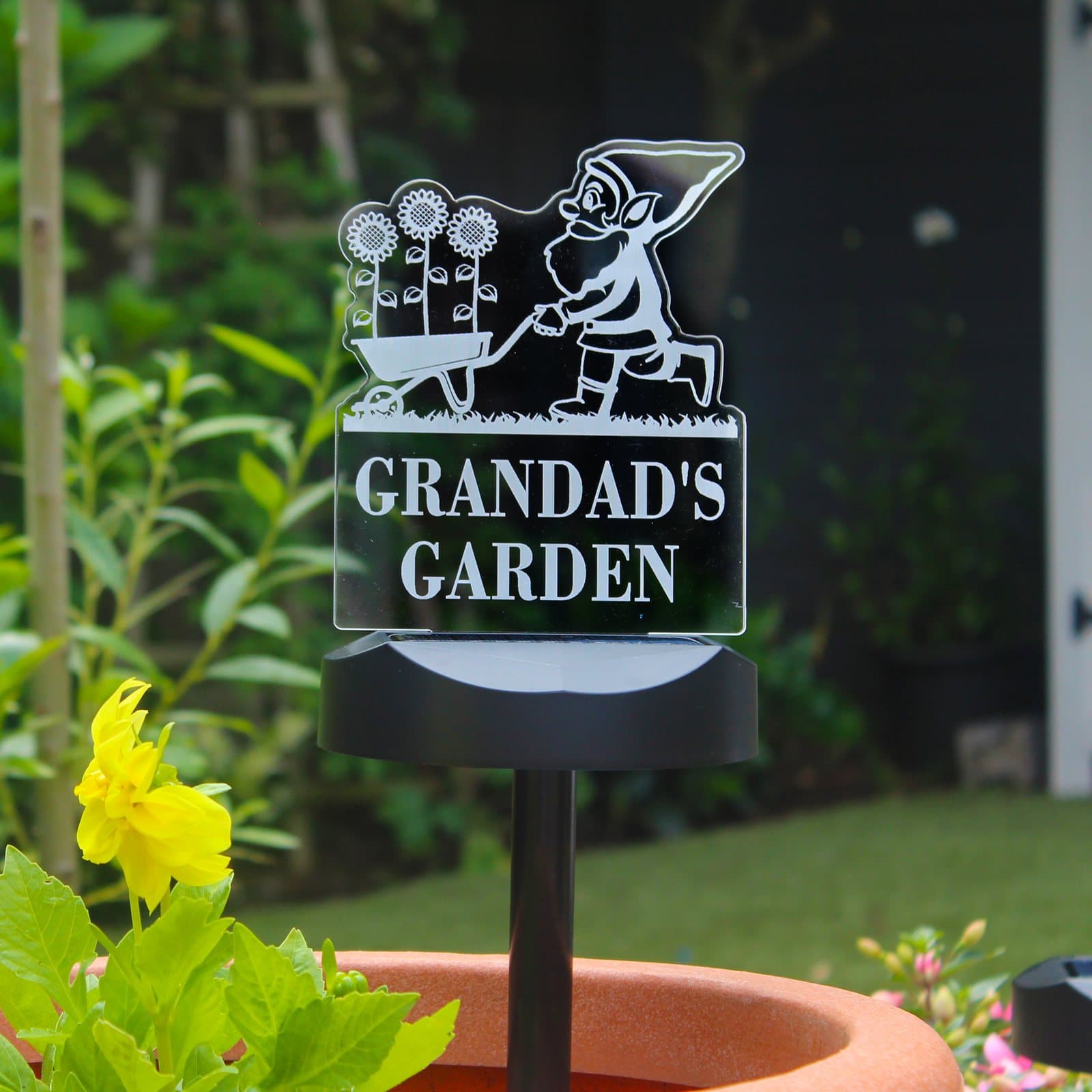 Gnome garden solar light with a personalised sign on a ground stick