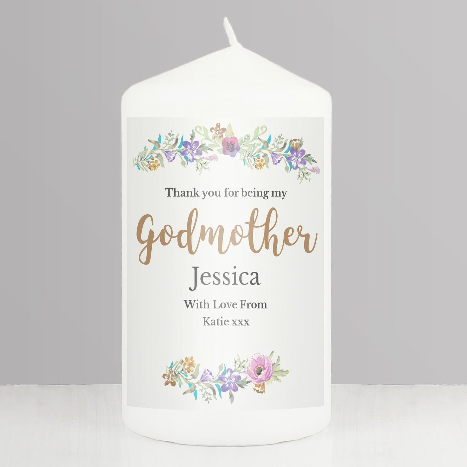 Pillar candle with a floral watercolour design and godmother wording
