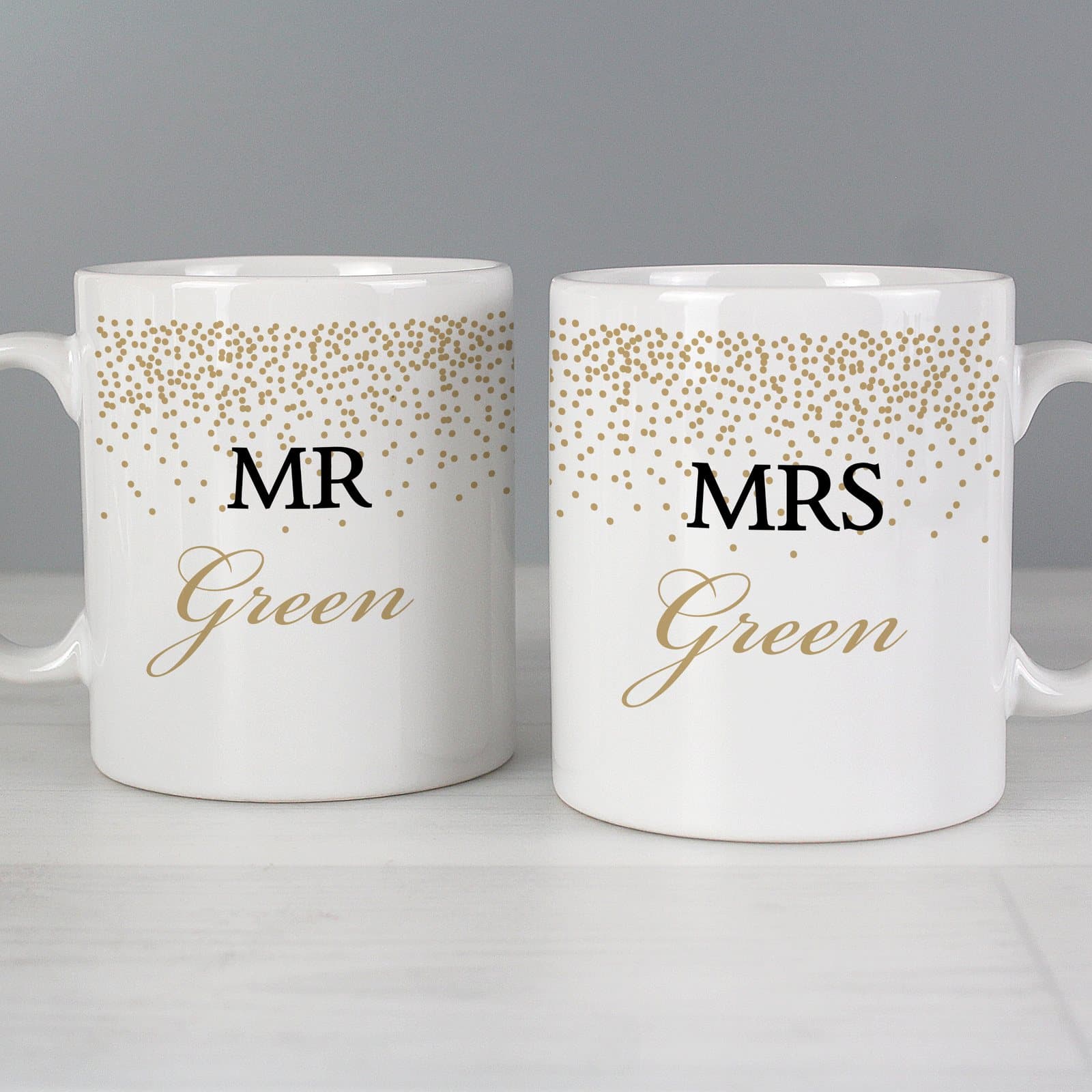 Set of two ceramic gold confetti wedding mugs