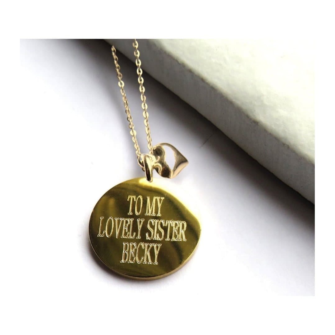 Yellow gold plated disc and mini heart necklace on a fine chain