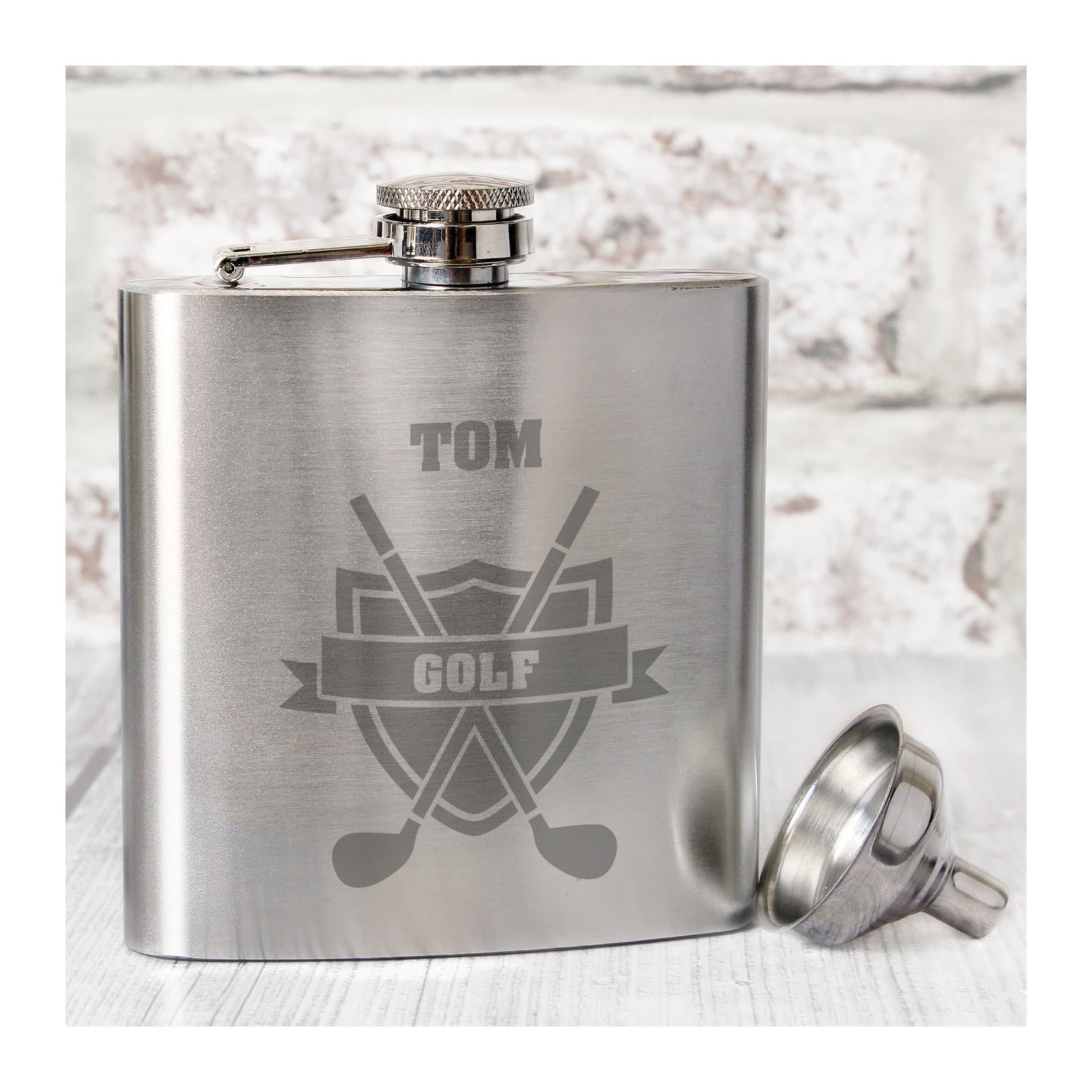 Stainless steel hip flask with a golf crest design, the word GOLF and a name