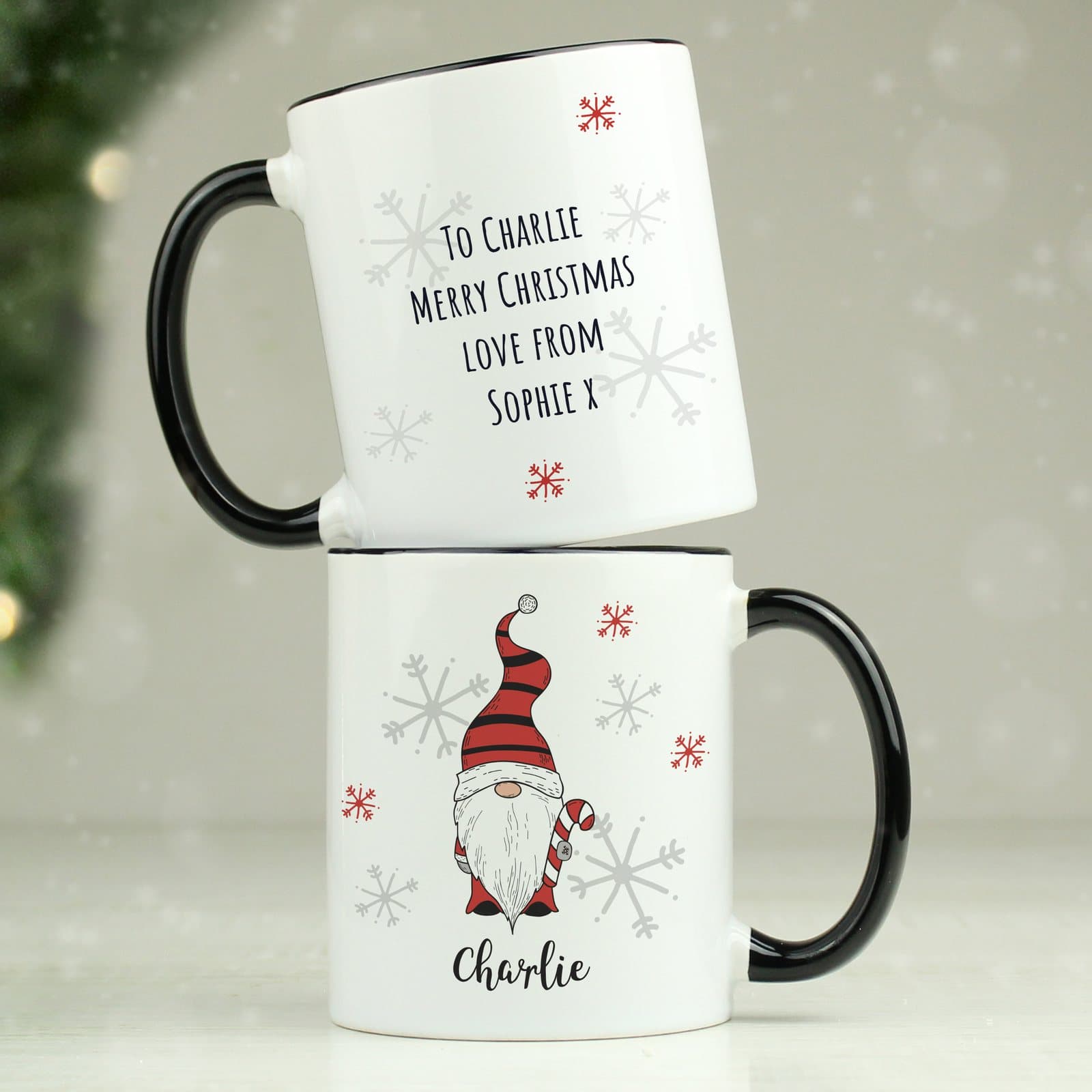 Gonk family Christmas mug with a black handle, personalised with a name
