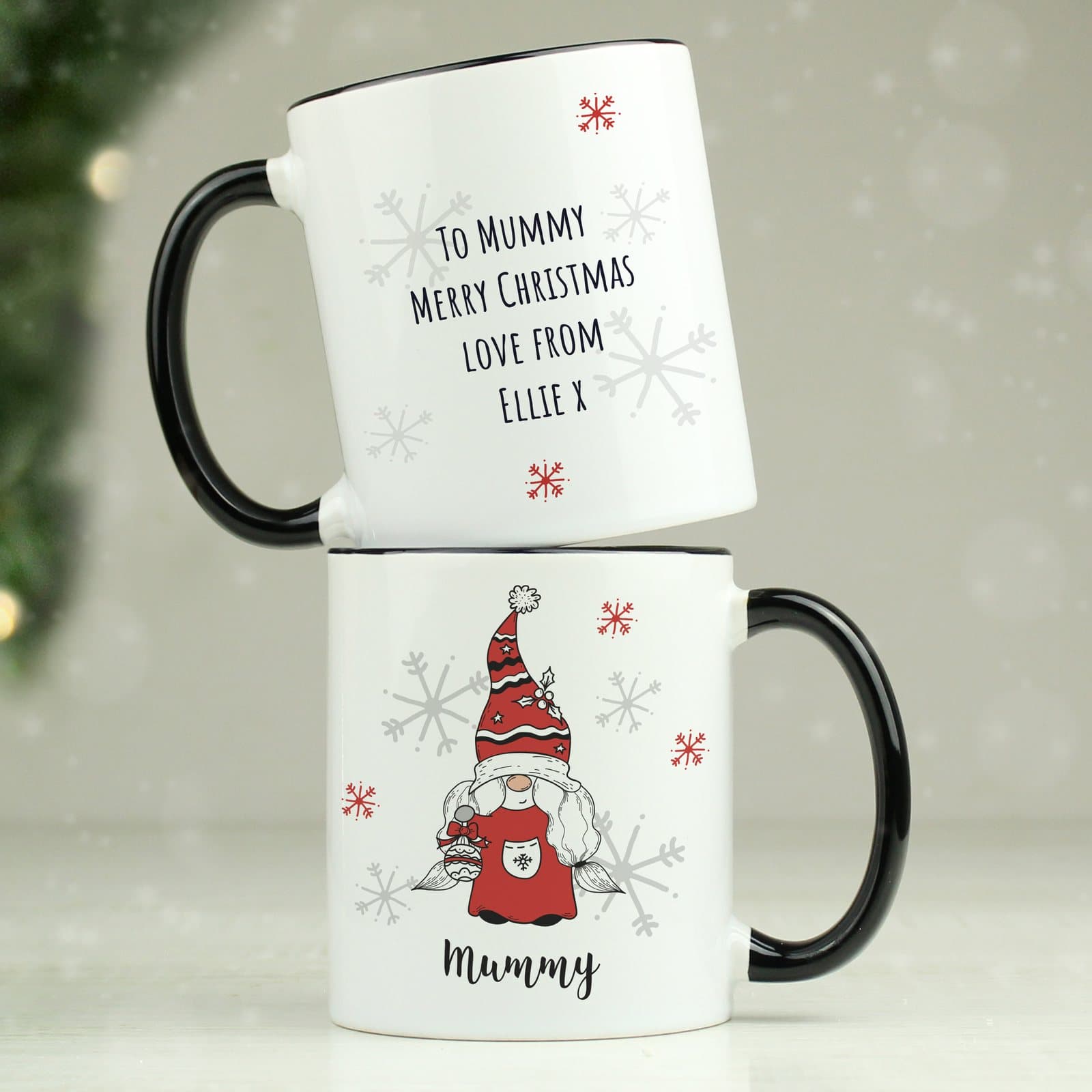 Gonk family Christmas mug with a black handle, personalised with a name
