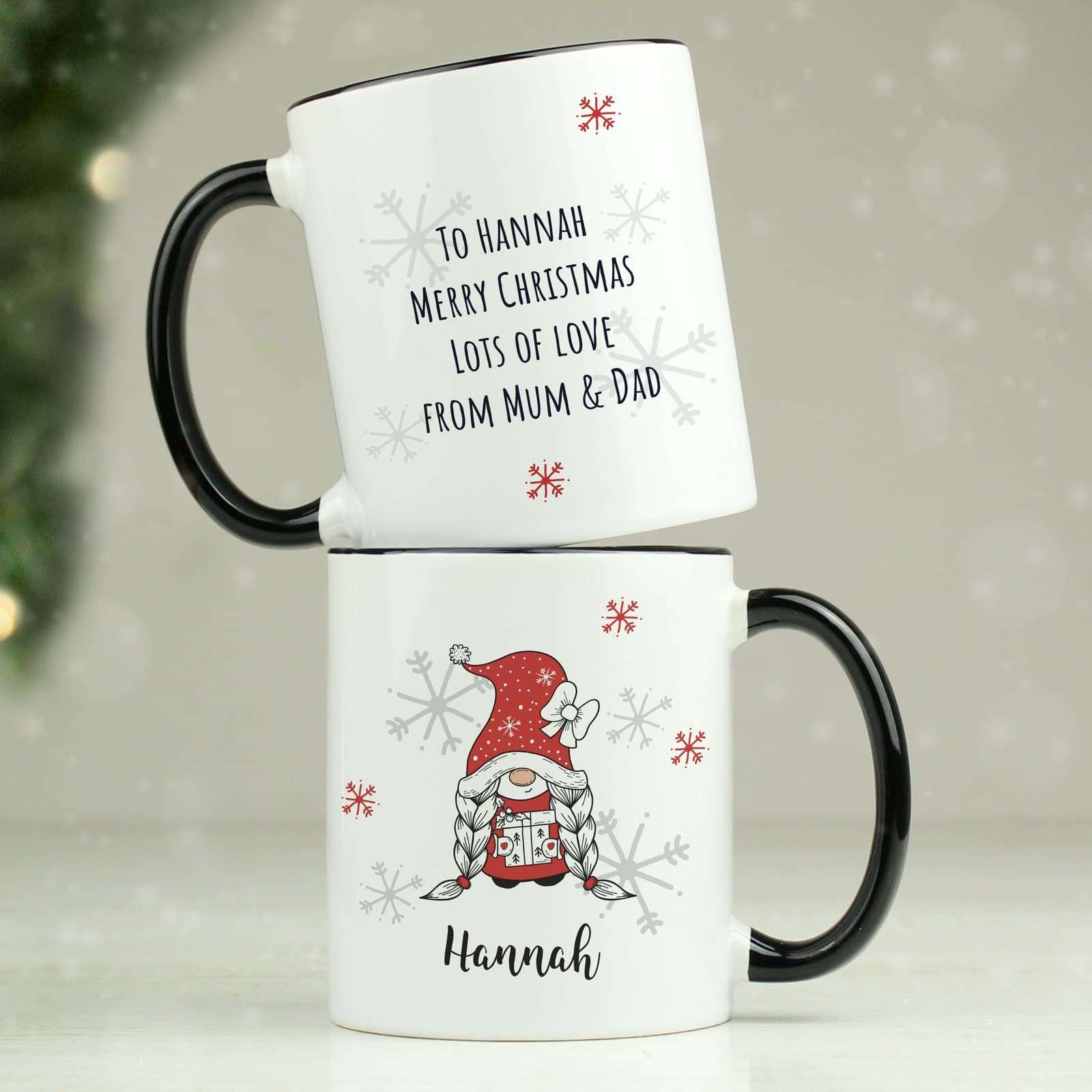 Gonk family Christmas mug with a black handle, personalised with a name