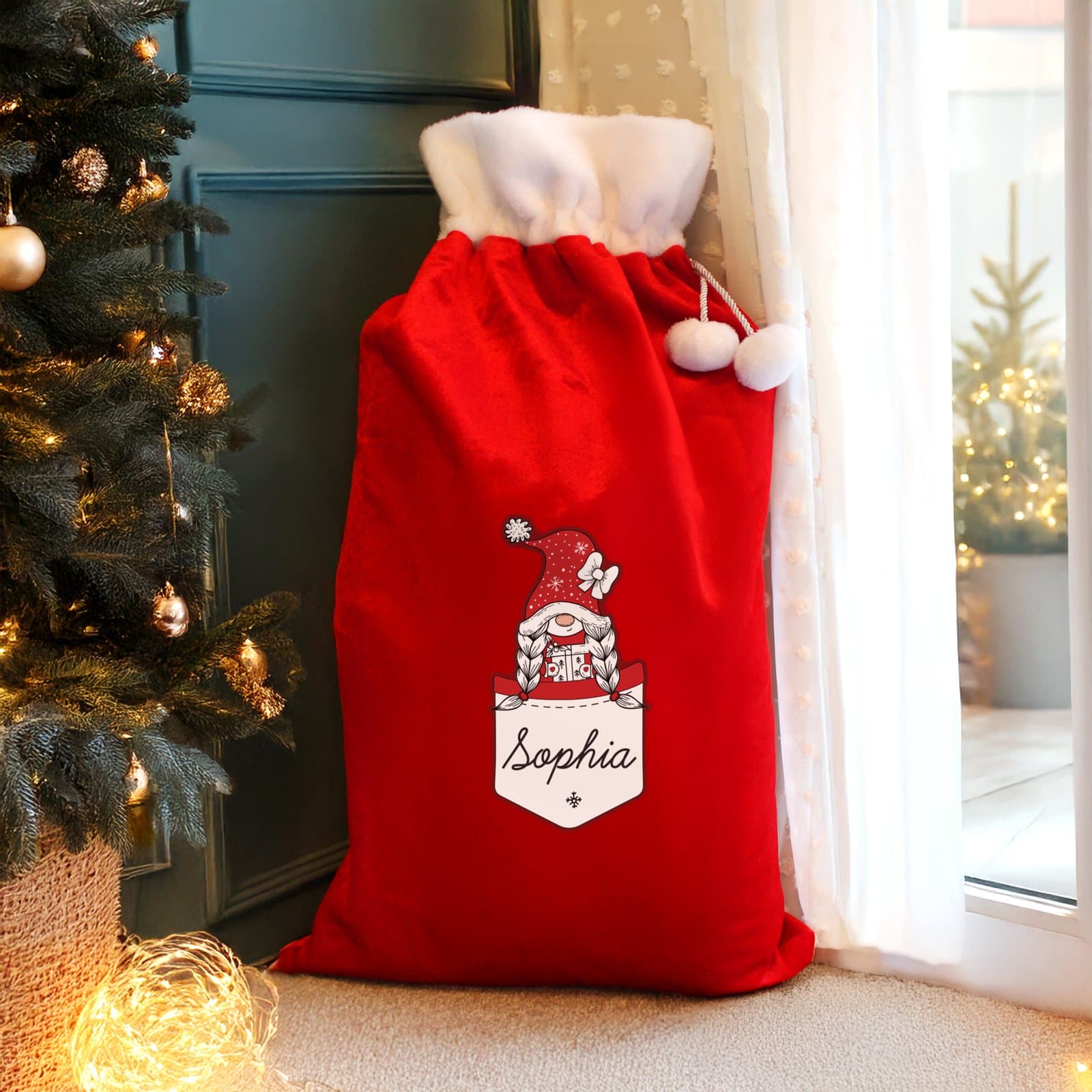 Red fleece Christmas sack with a female Gonk character