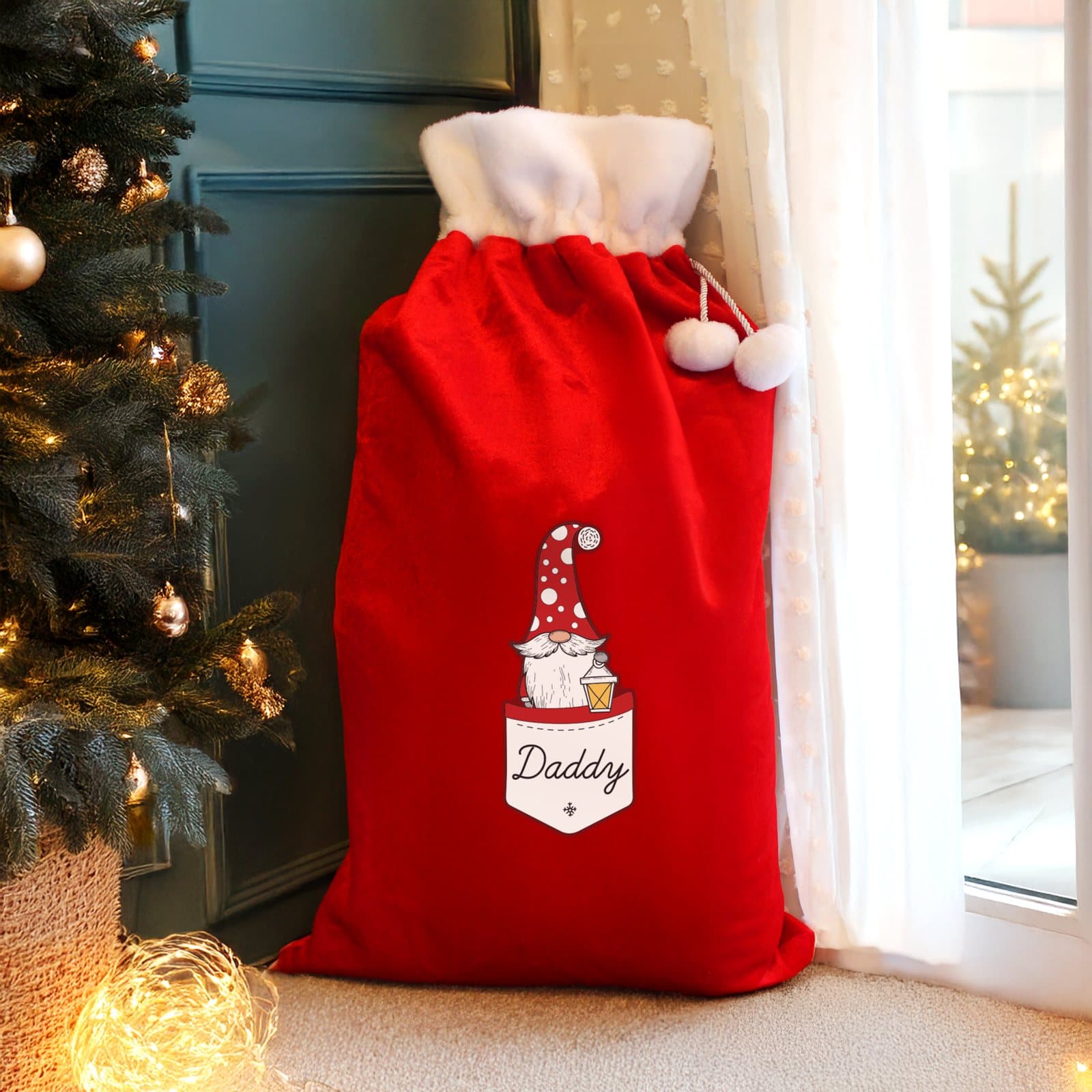 Red fleece Christmas sack with a male Gonk character