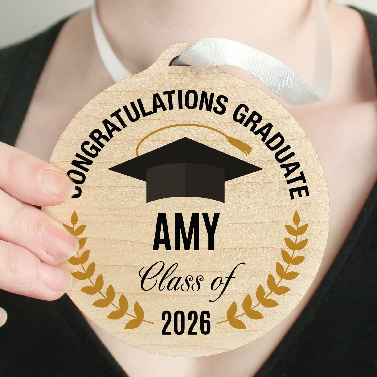 Round wooden graduation decoration with ribbon