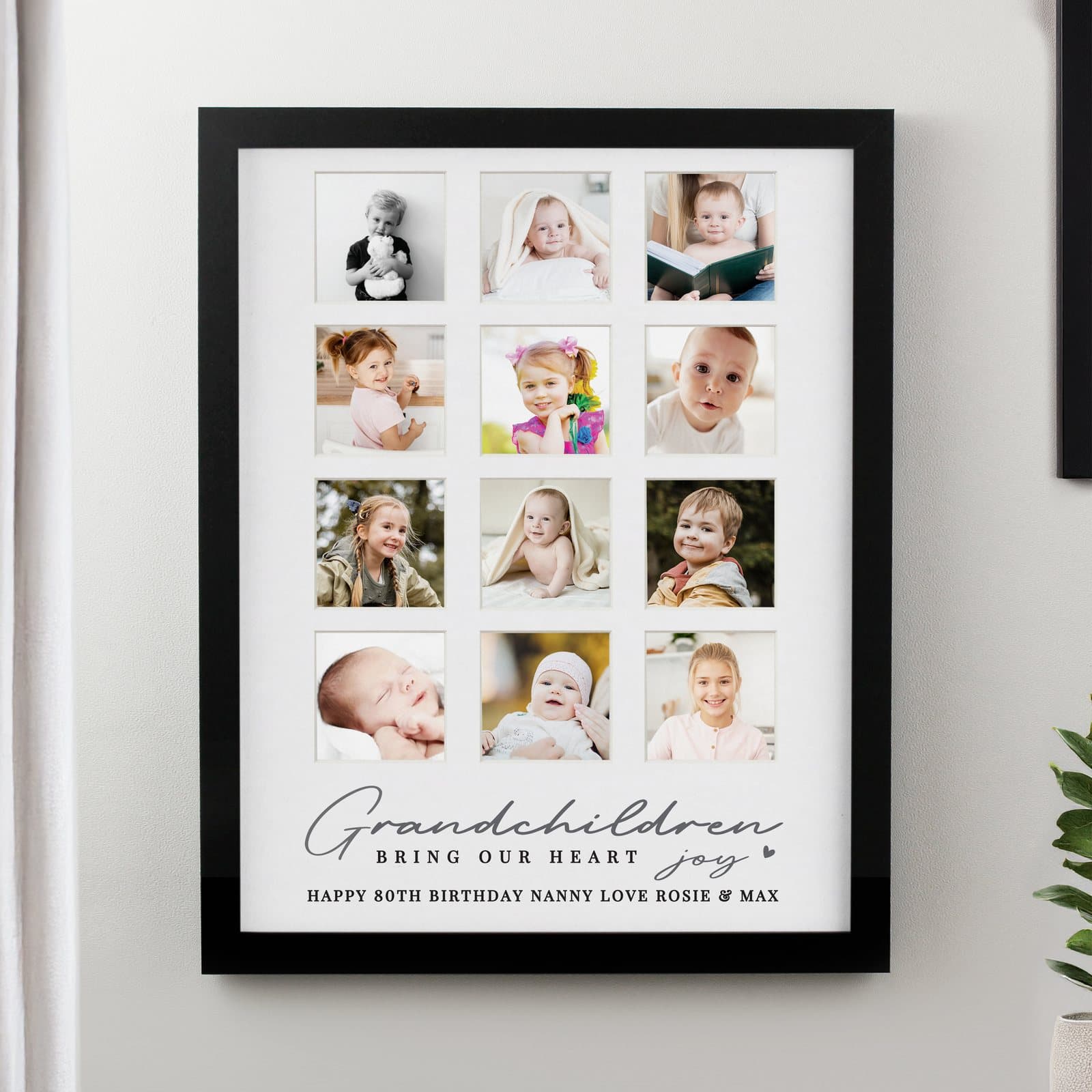Large black or white multi photo frame with 12 photo spaces and grandchildren text