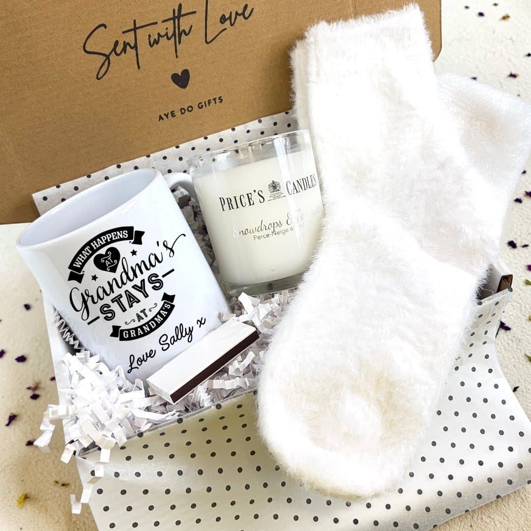 Grandma's House mug, candle, fluffy socks and matches in a gift hamper