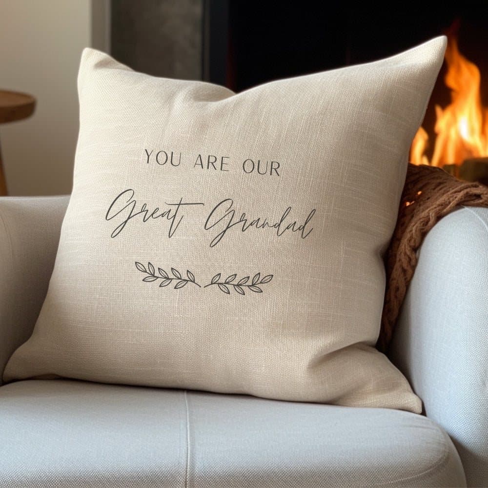 Cream square cushion with a simple leaf design and personalised text