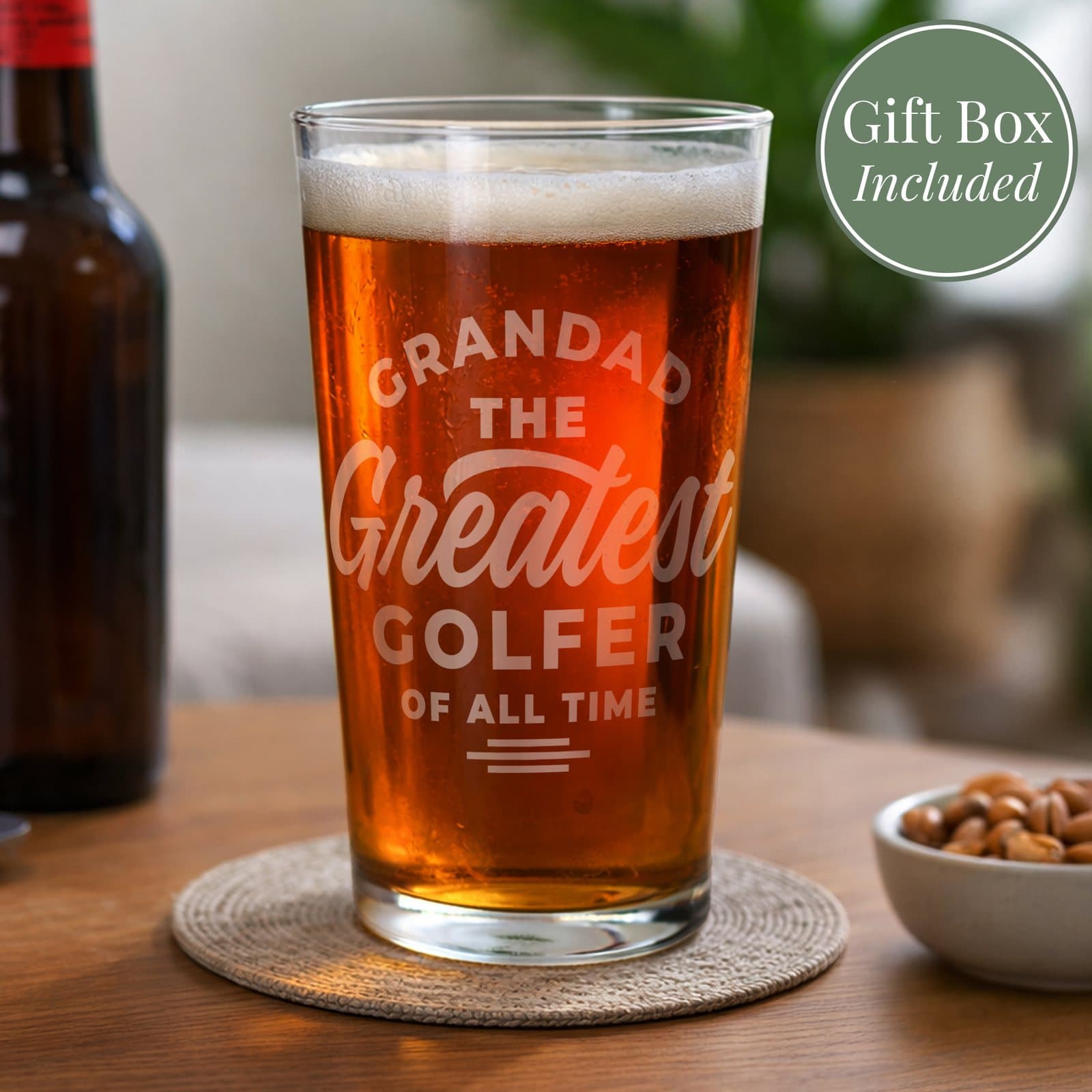 Pint glass with THE GREATEST OF ALL TIME text, a name and a sport