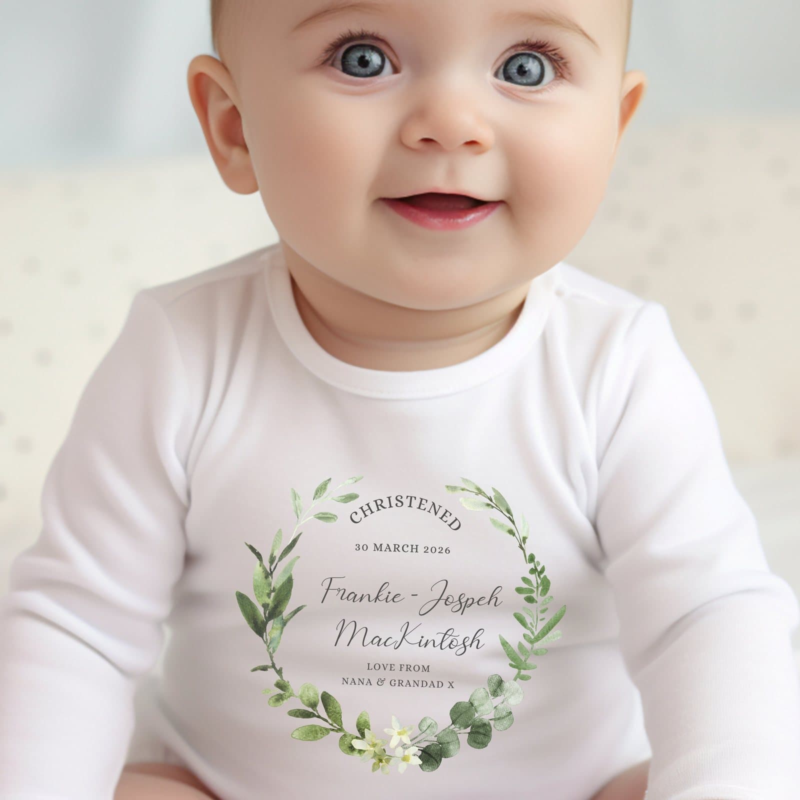 Personalised green floral christening baby grow with a name in the design