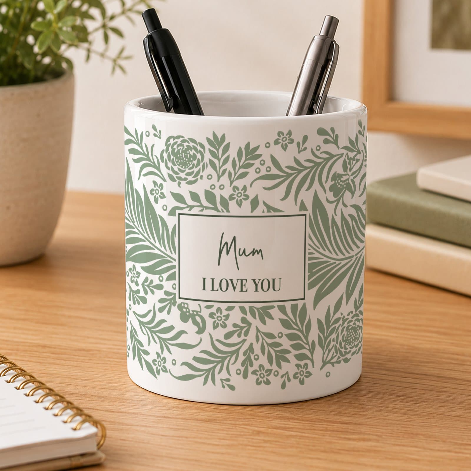 Ceramic storage pot with a botanical design and personalised text