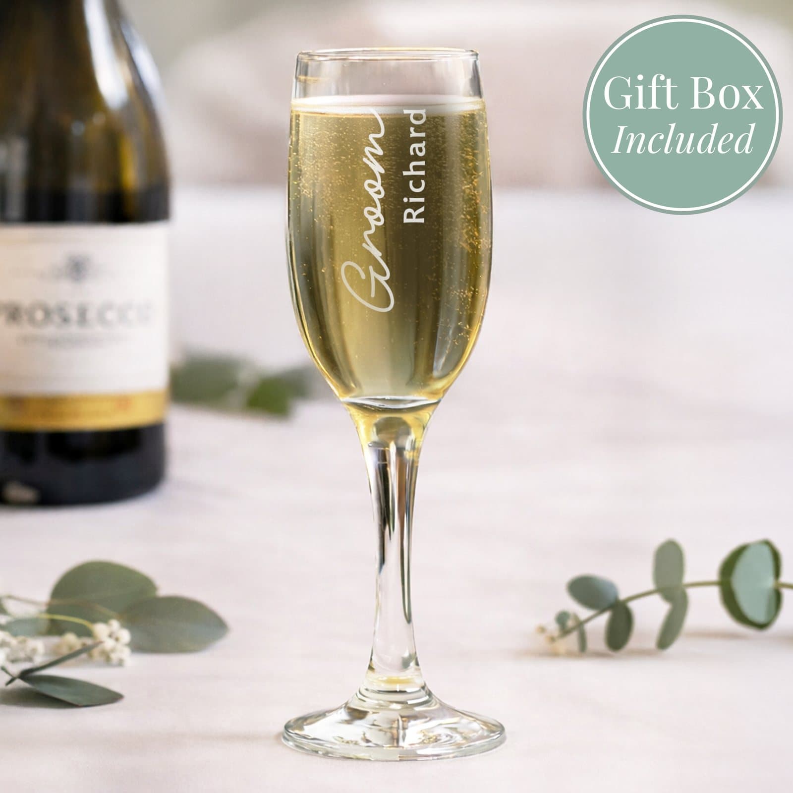 Glass flute personalised with the groom's name