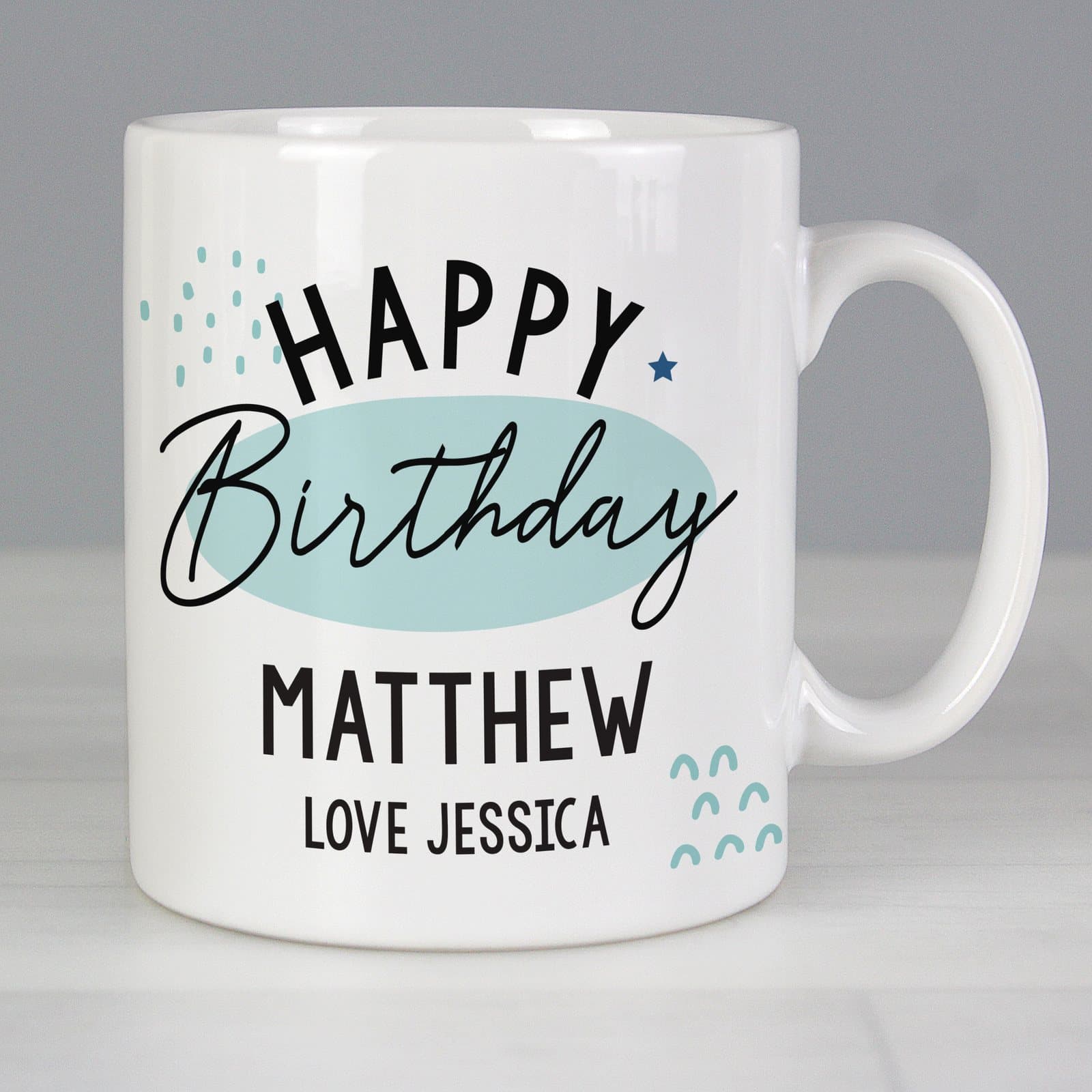 Ceramic happy birthday mug personalised with a name and message
