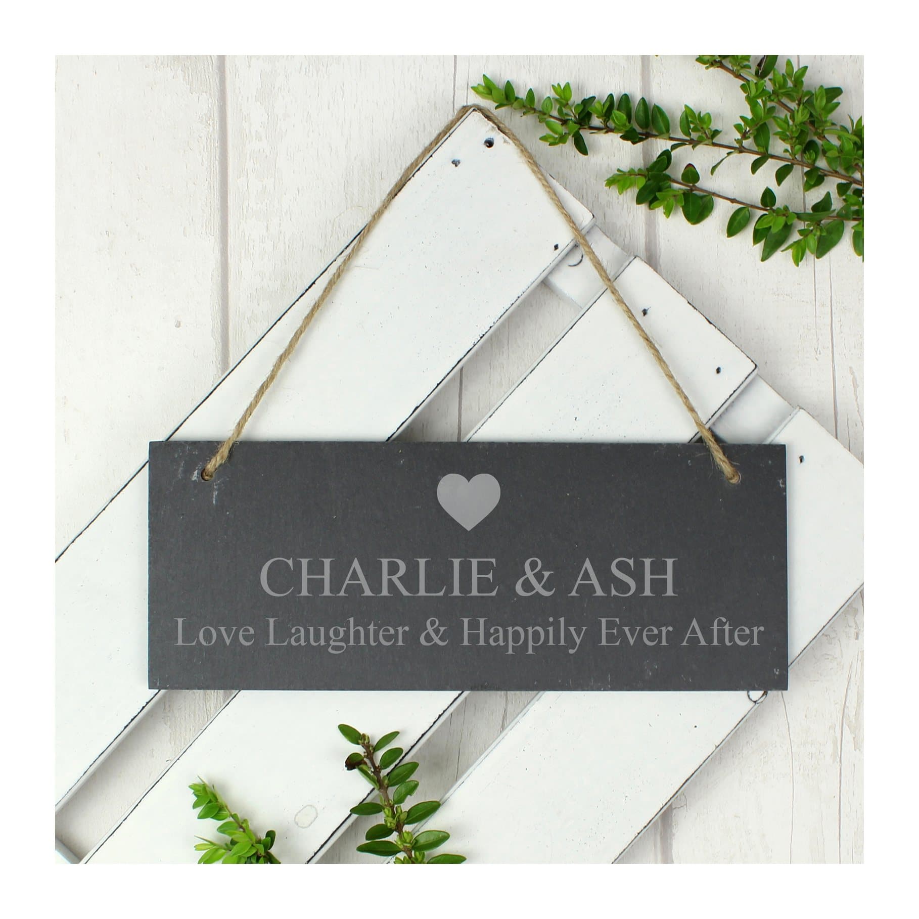 Hanging slate plaque with a heart motif above a bold line and a message line