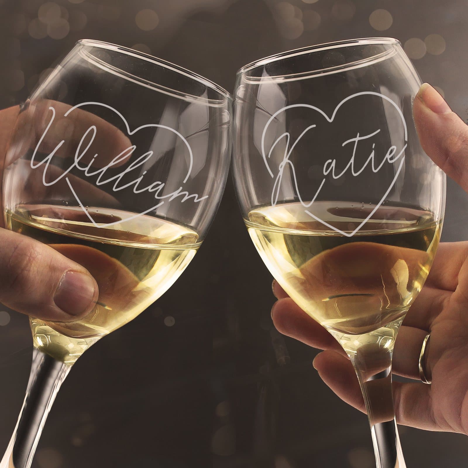 Personalised heart name wine glass set