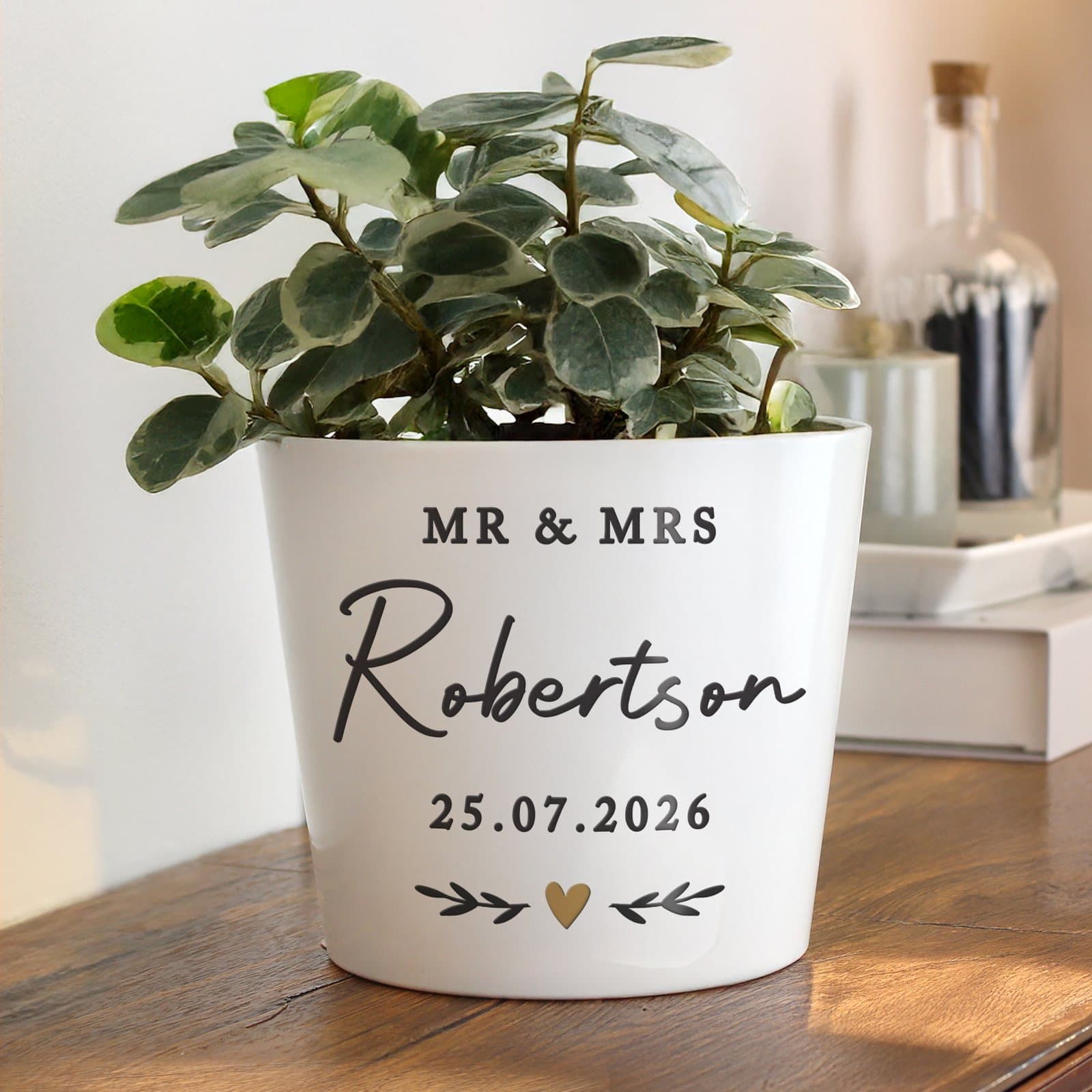 Ceramic heart plant pot personalised with lines of text