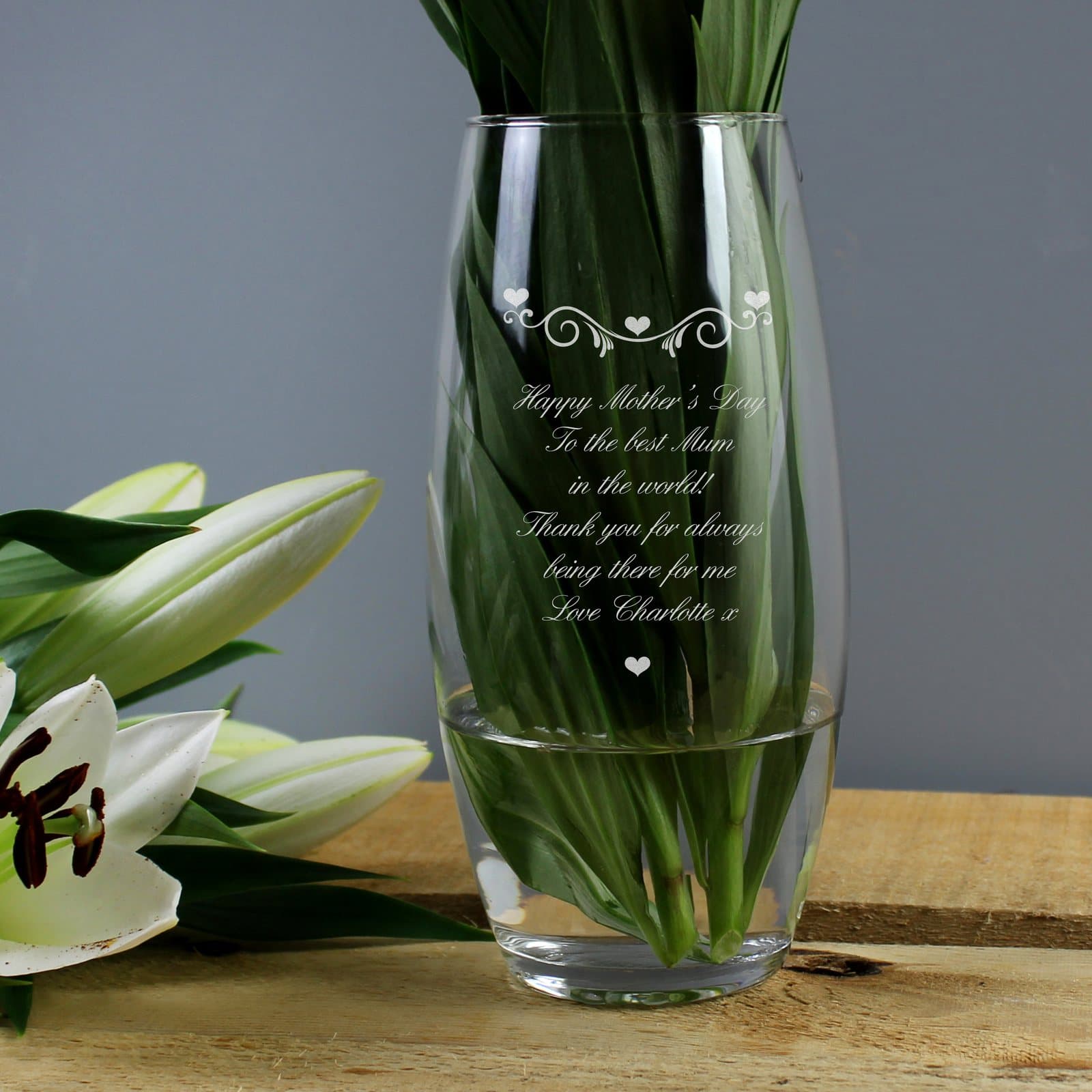 Bullet vase with a hearts and swirls design and a personalised message