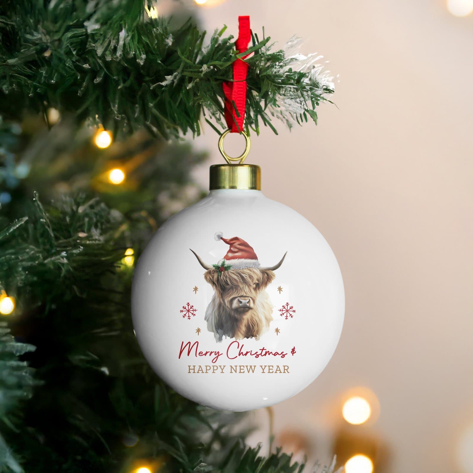 Personalised Highland cow Christmas bauble with ribbon