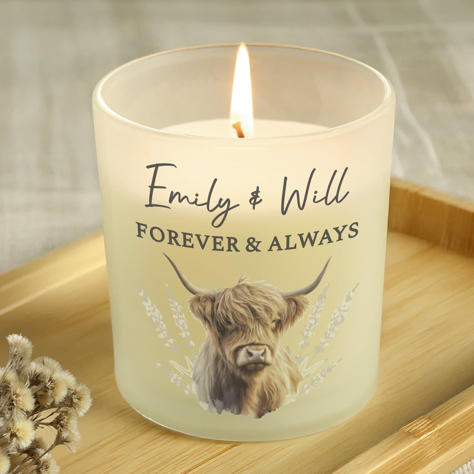 Frosted glass candle jar with a printed Highland cow and personalised text