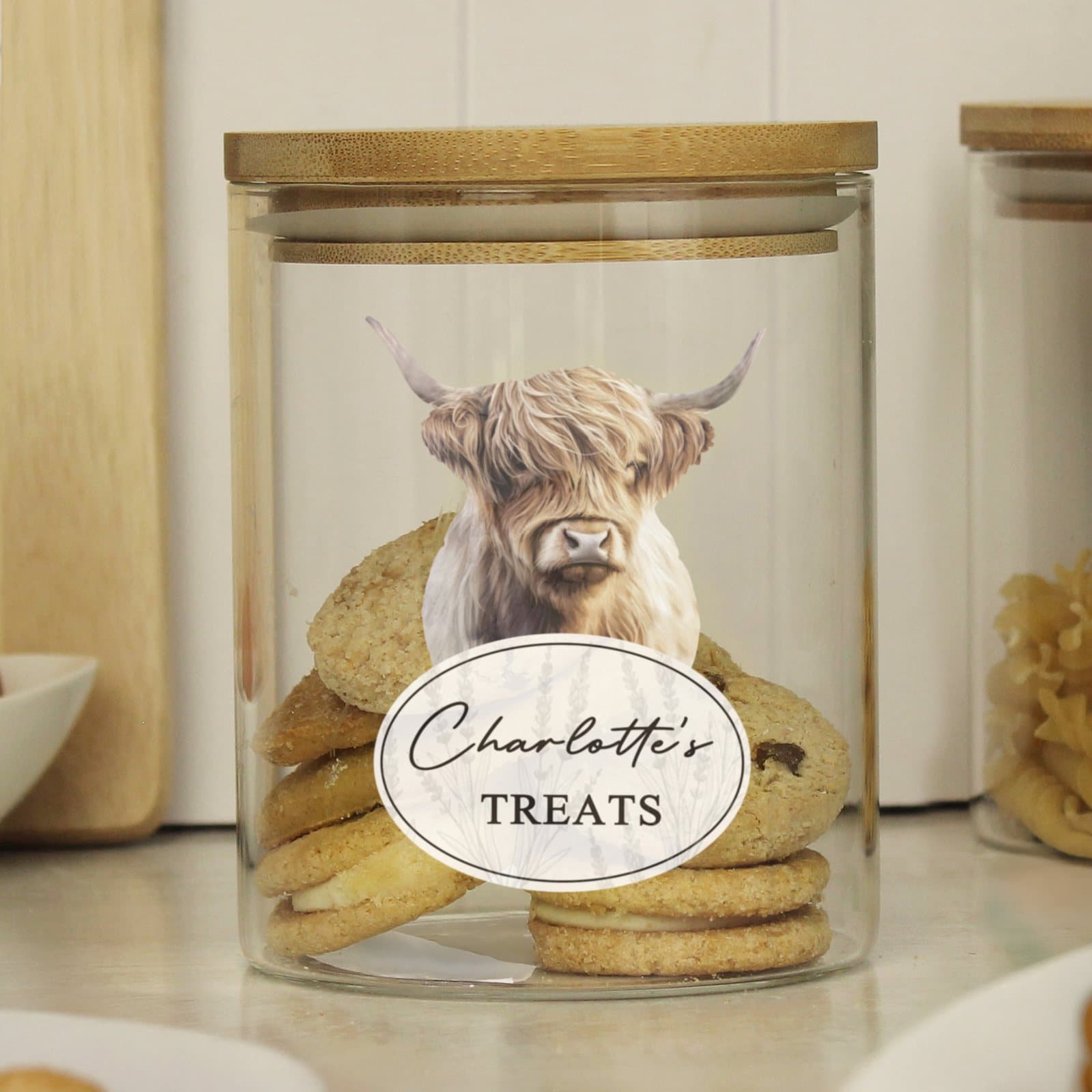 Personalised Highland cow glass storage jar with bamboo lid
