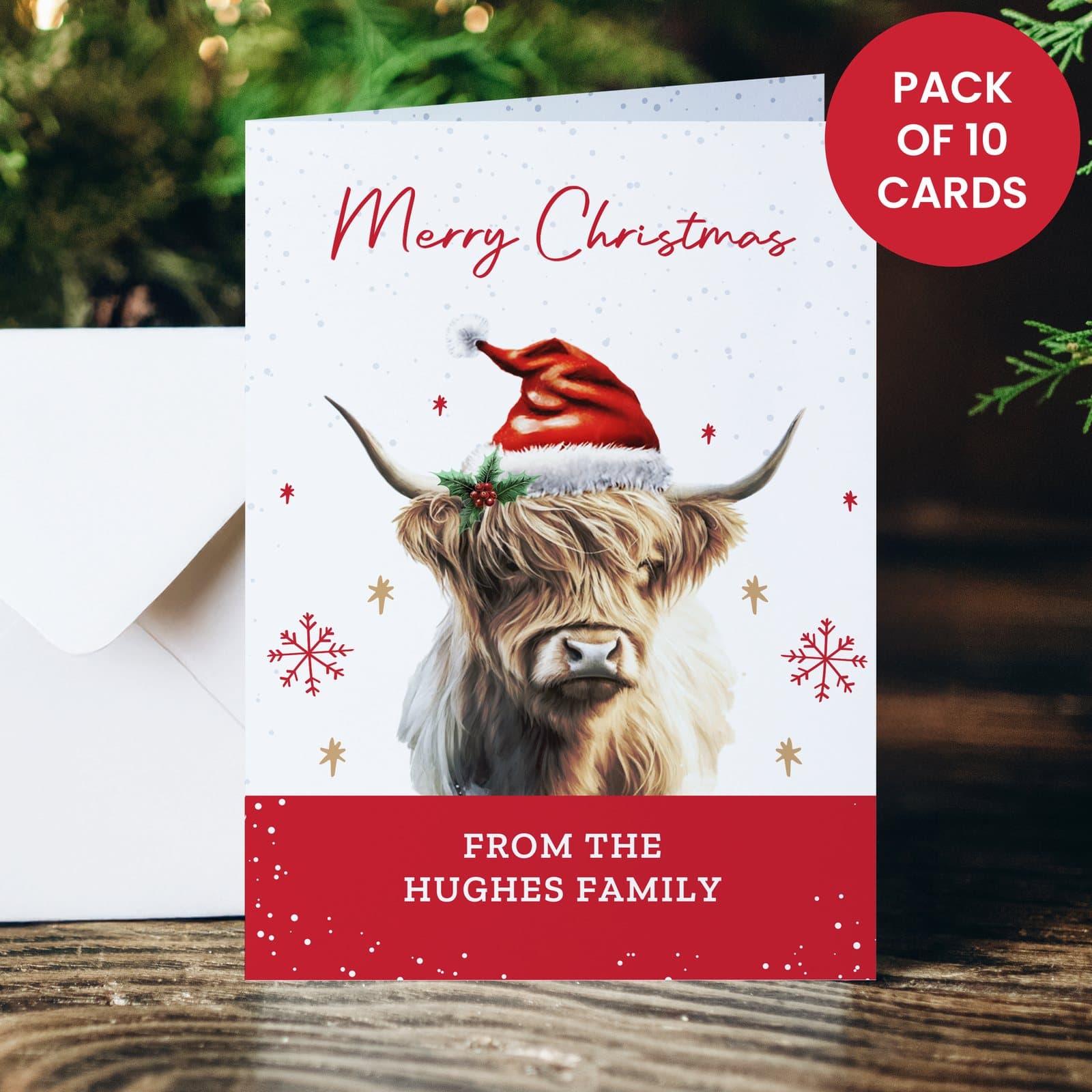 Highland cow Christmas card showing an illustrated cow in a wintry scene