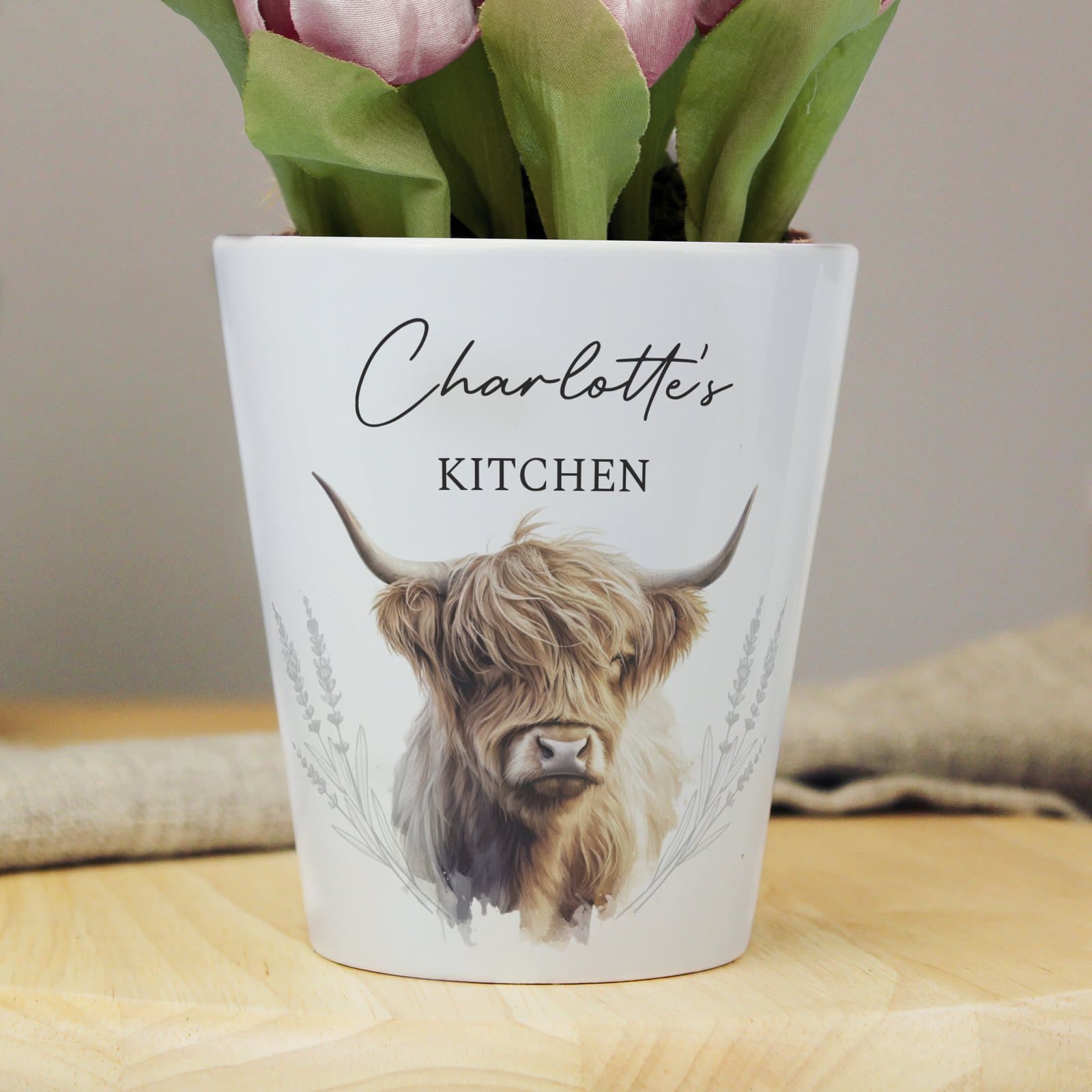 Ceramic Highland cow plant pot with two lines of personalised text