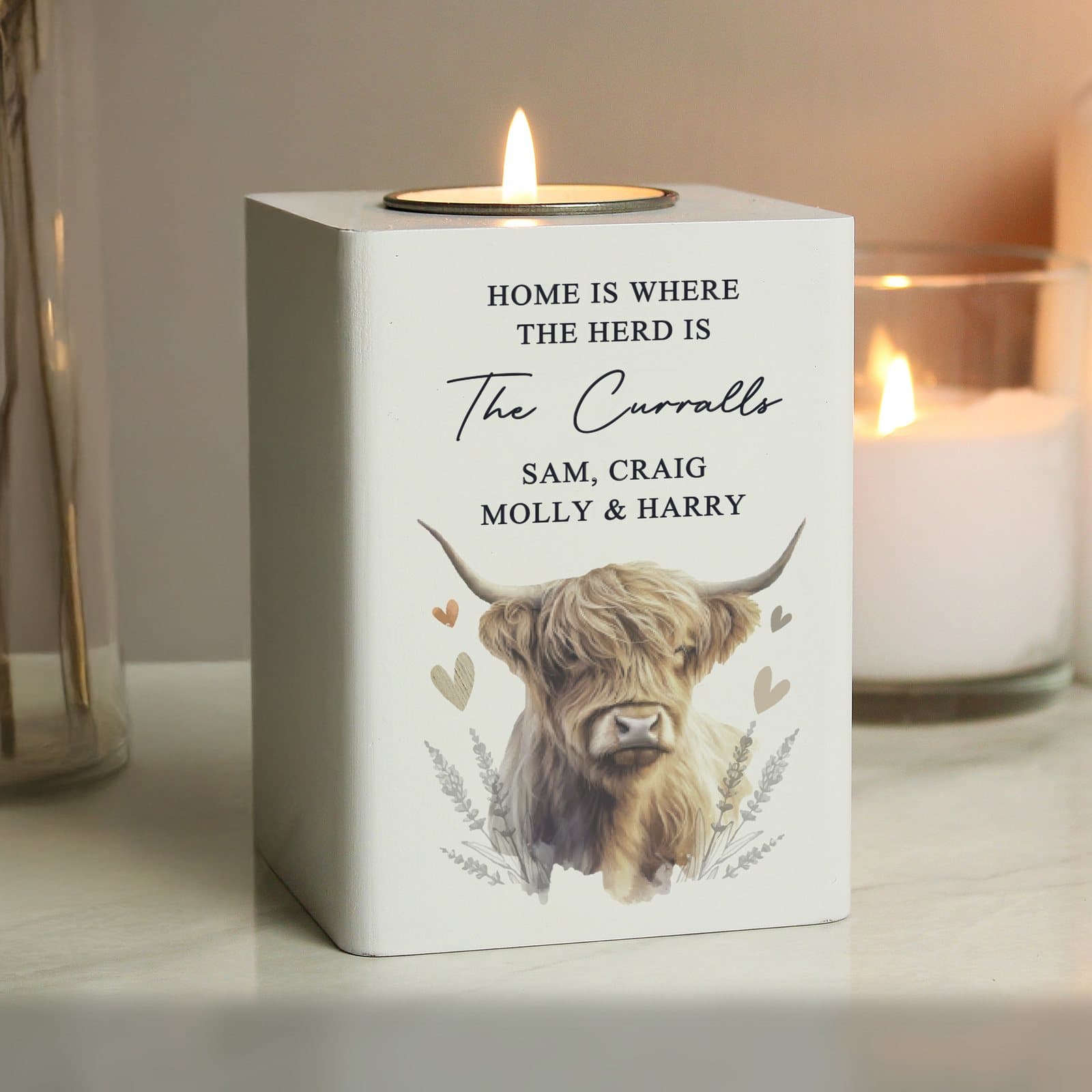 White wooden Highland cow tealight holder with five lines of personalised text