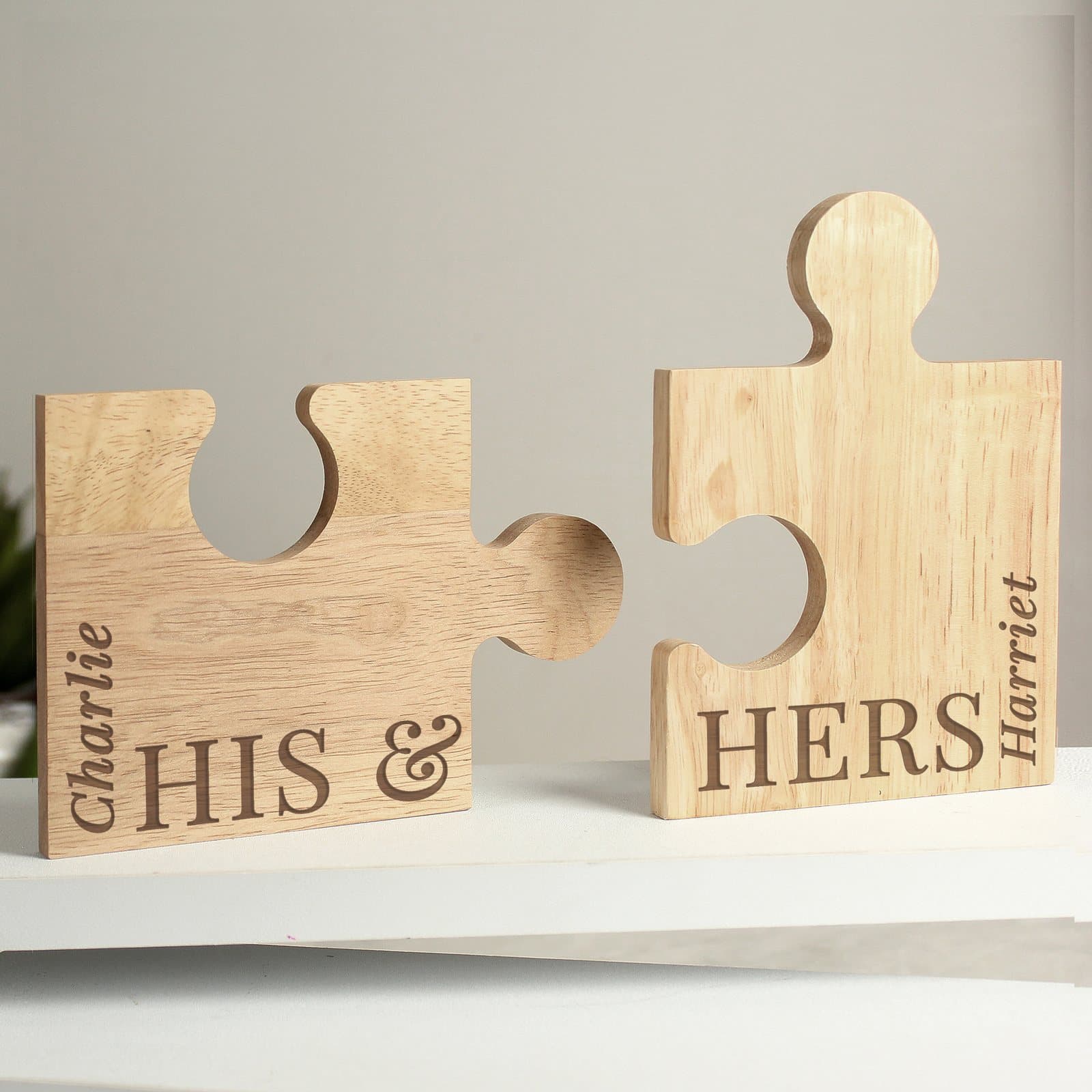Wooden his and hers jigsaw pieces with personalised names