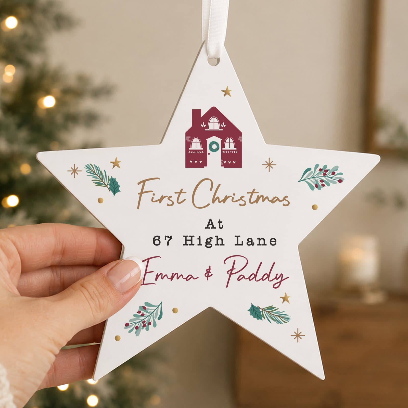 Wooden star ornament with ribbon and personalised lines of text