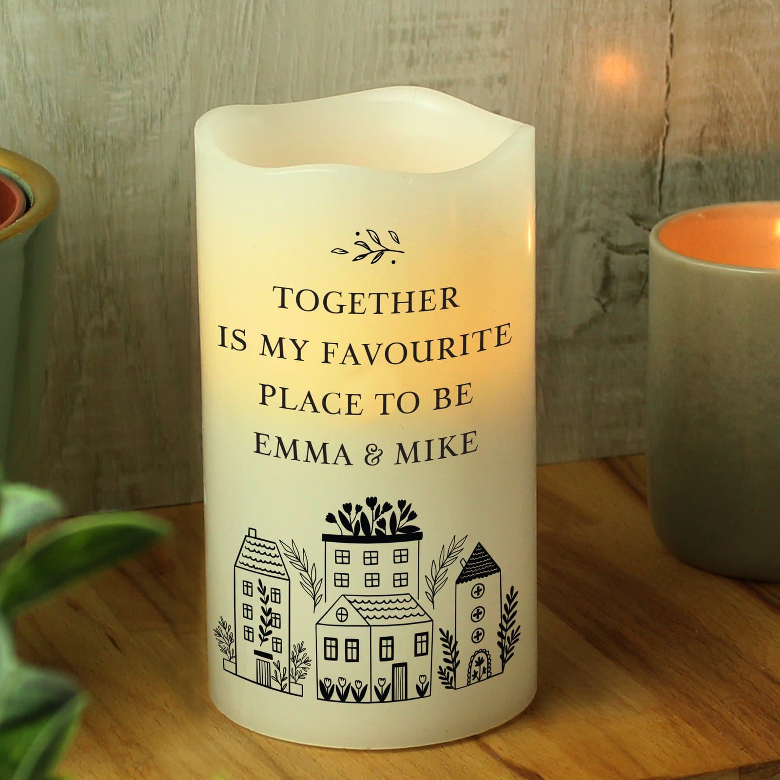Personalised home LED candle with four lines of text and an organza bag