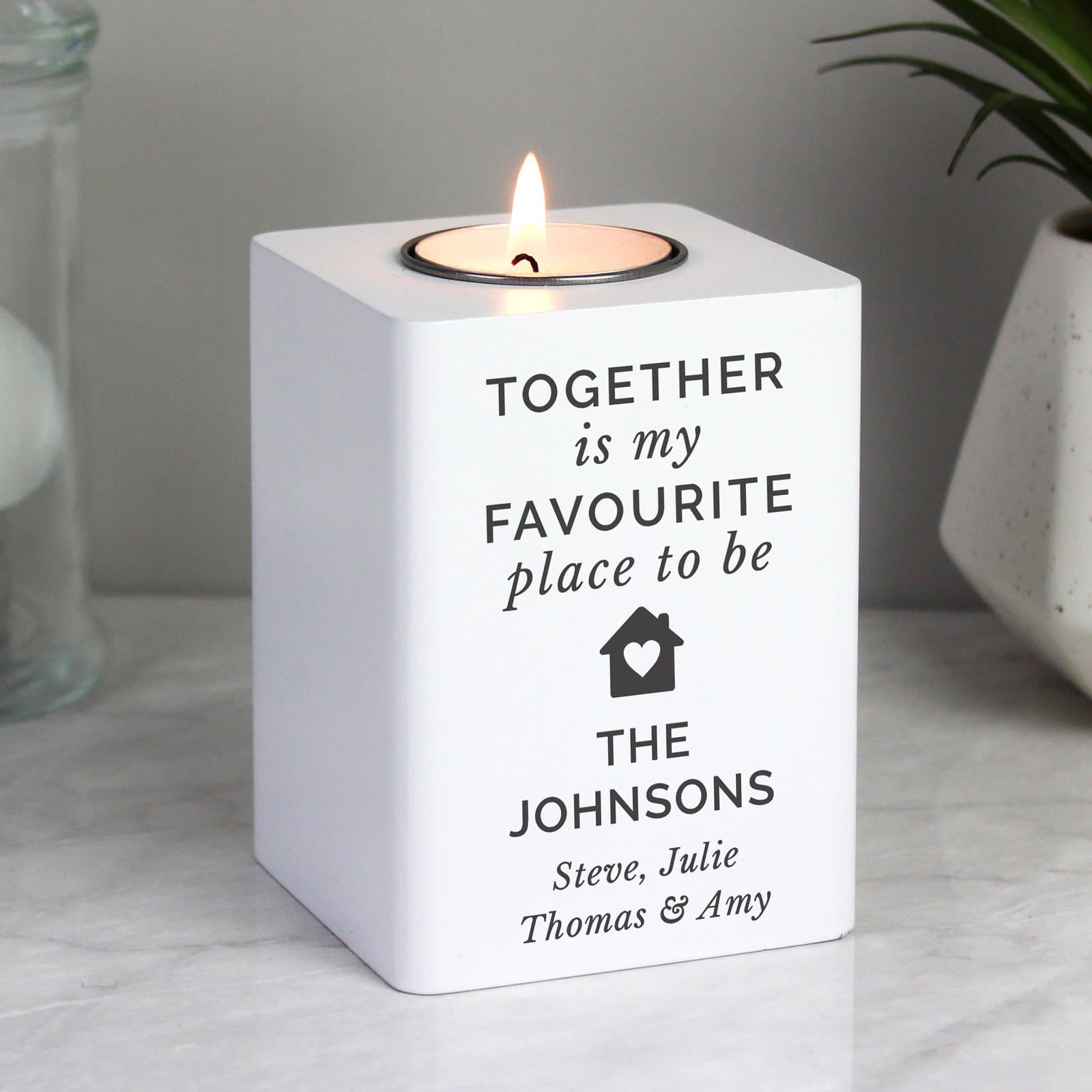 White wooden house tea light holder with personalised lines of text