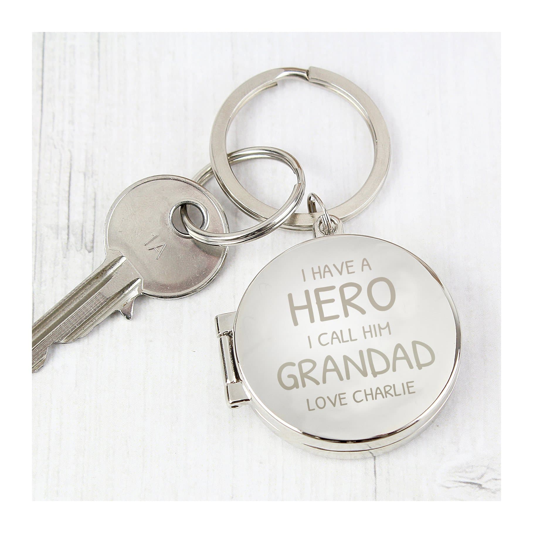 Round silver finish I Have A Hero photo keyring